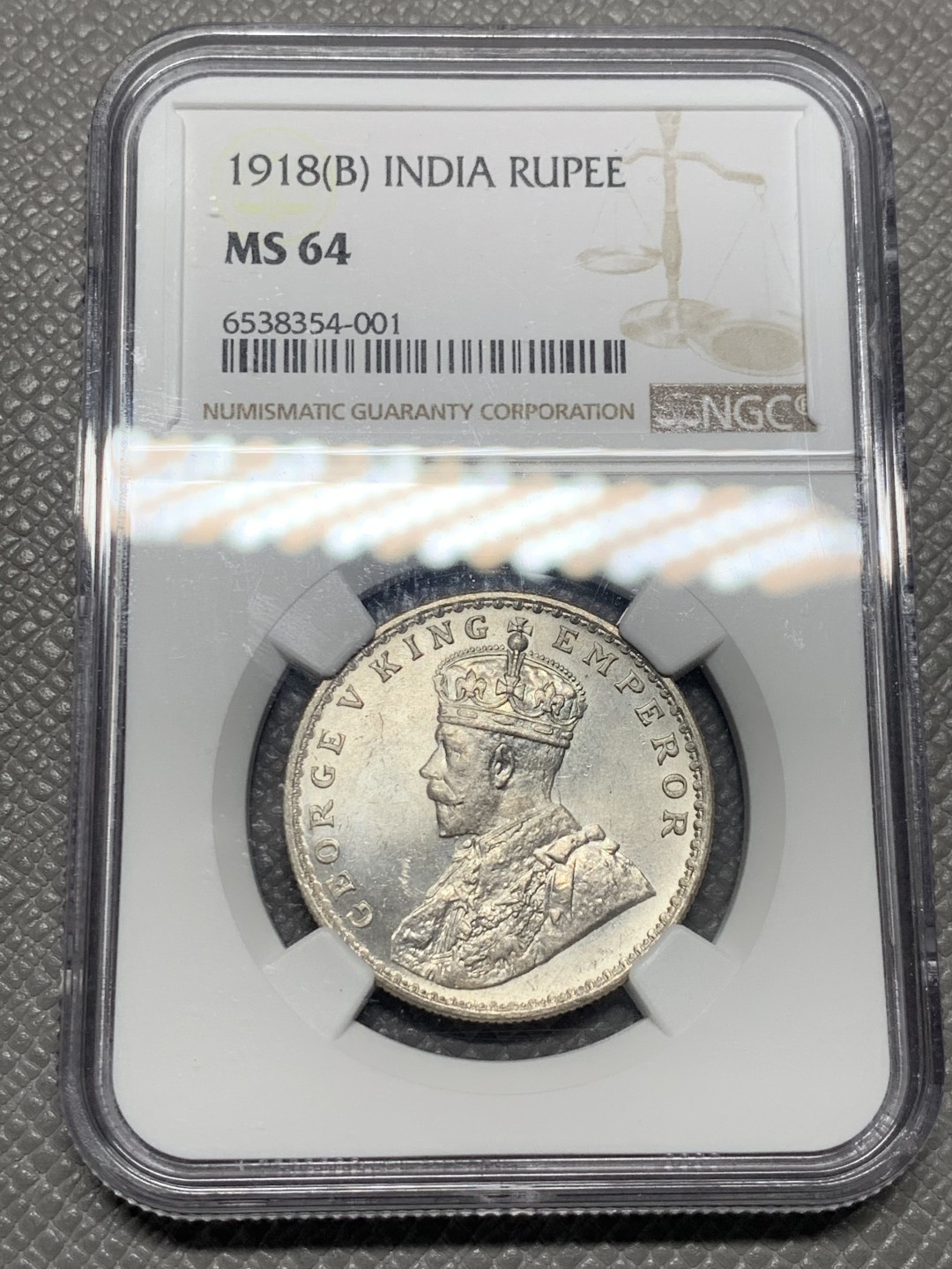 《竞宝斋》第136场-周日，周一连拍 (全场包邮) NGC MS64 英属印度 1918年B版 乔治五世 1卢比银币 满银光美品 状态出众