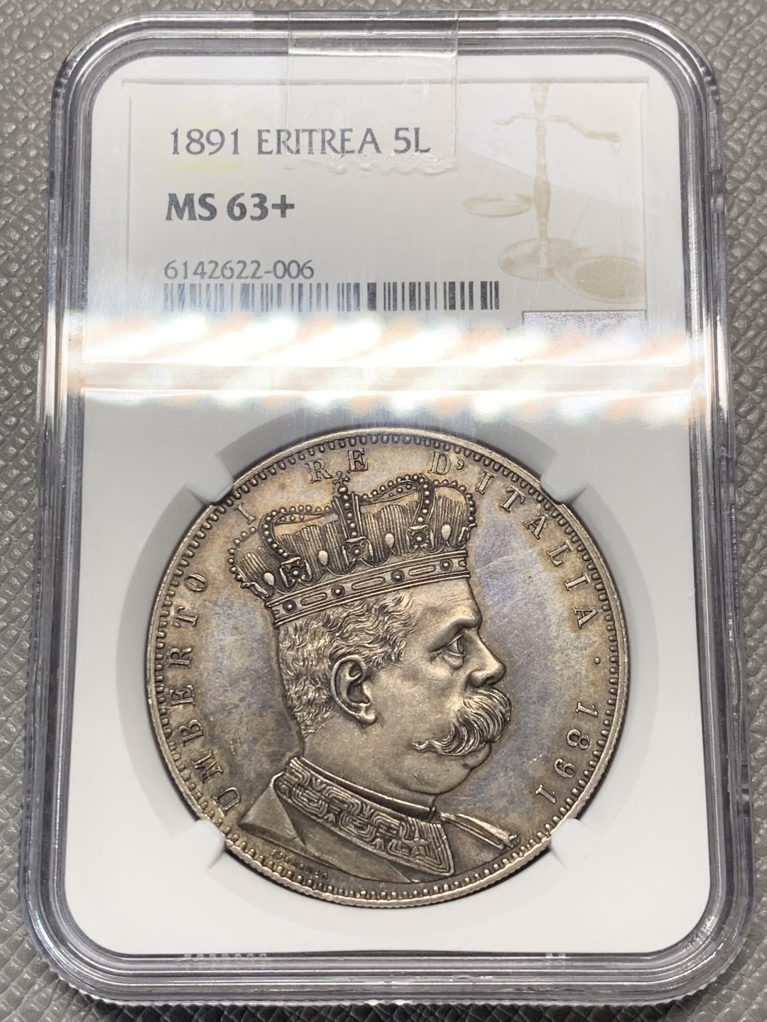 《竞宝斋》第136场-周日，周一连拍 (全场包邮) NGC MS63+ 意属厄立特里亚1891年 5里拉银币，意属殖民地大名誉品。一步到位的状态，非常舒服的包浆带PL感。2022年摩纳哥拍卖，总价9000欧落槌。包浆币给分保守了