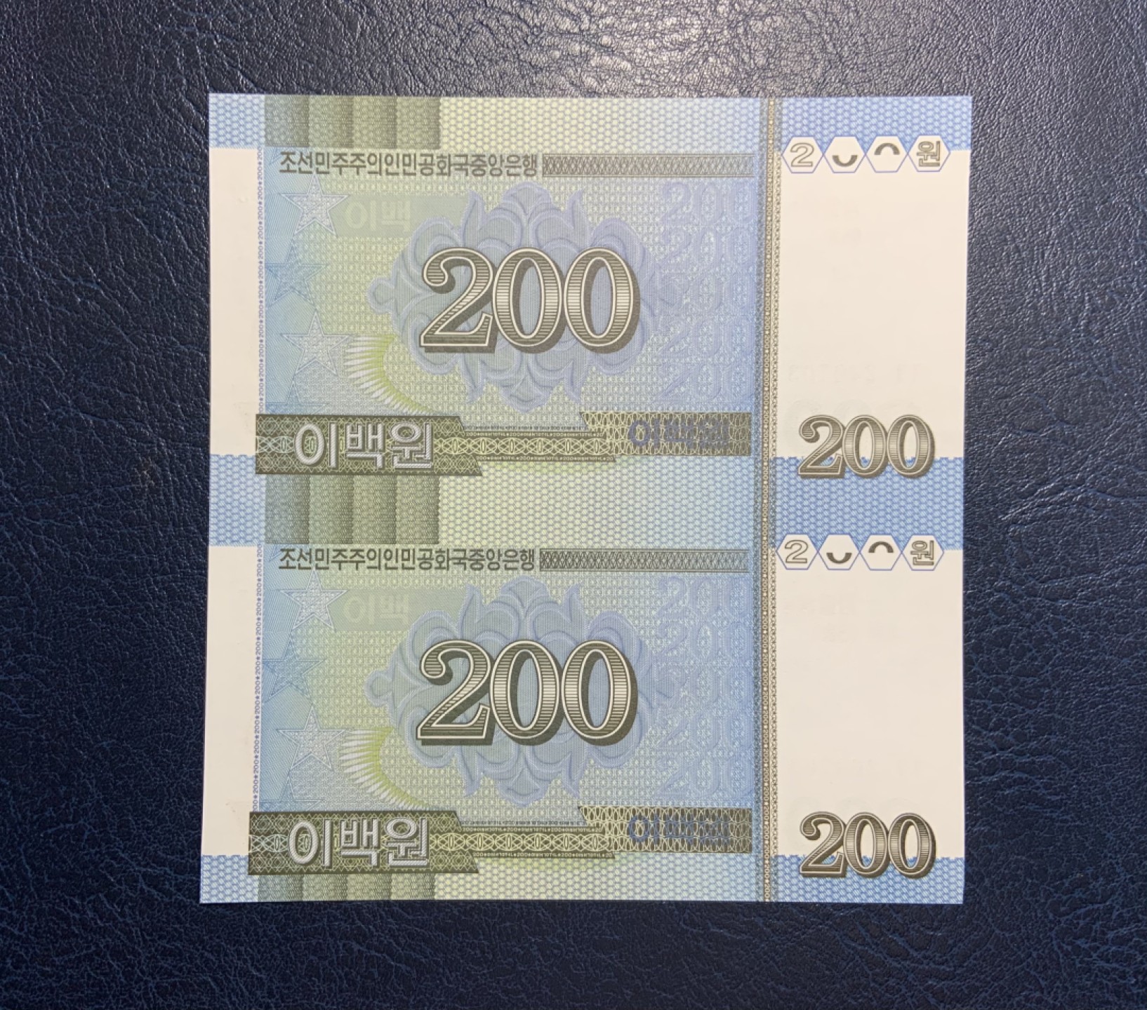收藏联盟Quantum Auction 第235期拍卖 朝鲜2005-07年200-5000元两连体 品相全新UNC(5000元角有瑕疵) 加盖金日成诞辰95周年纪念