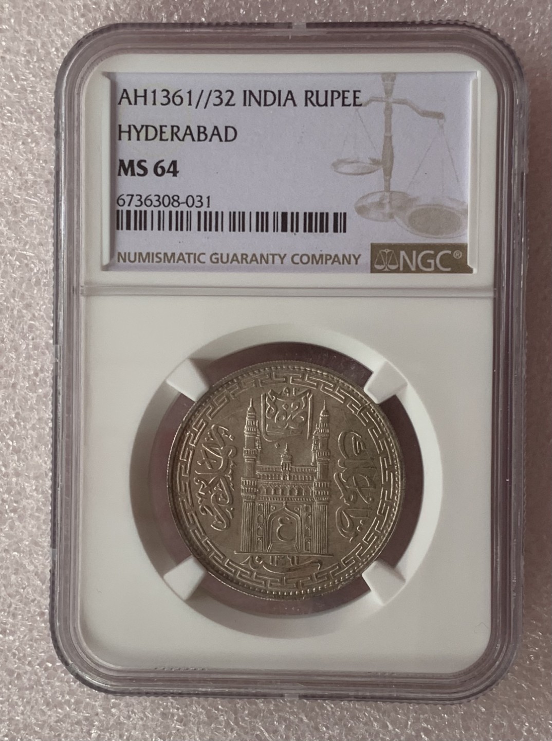 瓶子🏺第80期拍卖会 印度1361//32海德拉巴1卢比银币NGC MS64