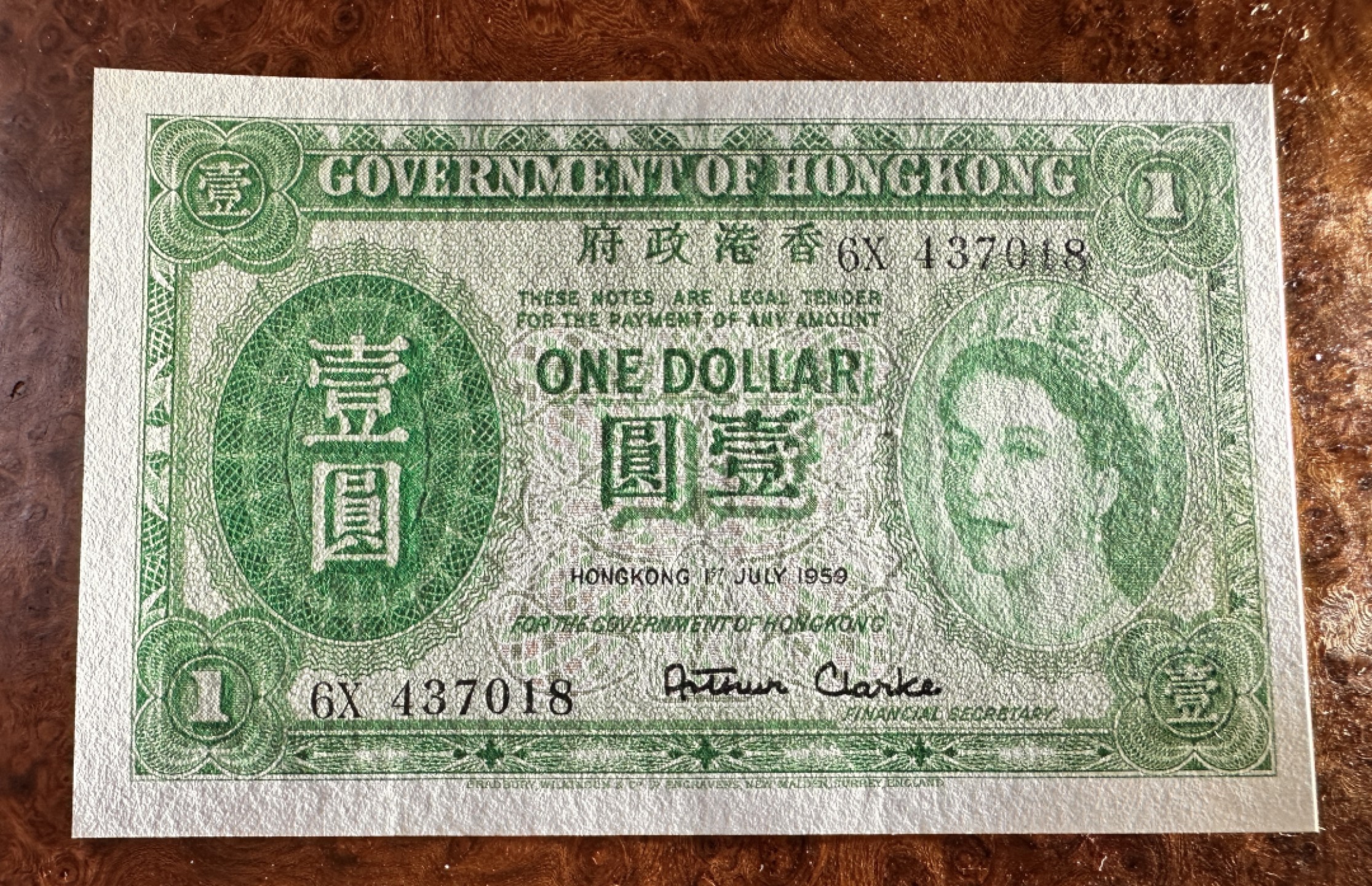 Chase Auction 第18期 - - 外钞、民国钞和人民币混合场！ 早期香港1元，大冠女王，品相如图，UNC-