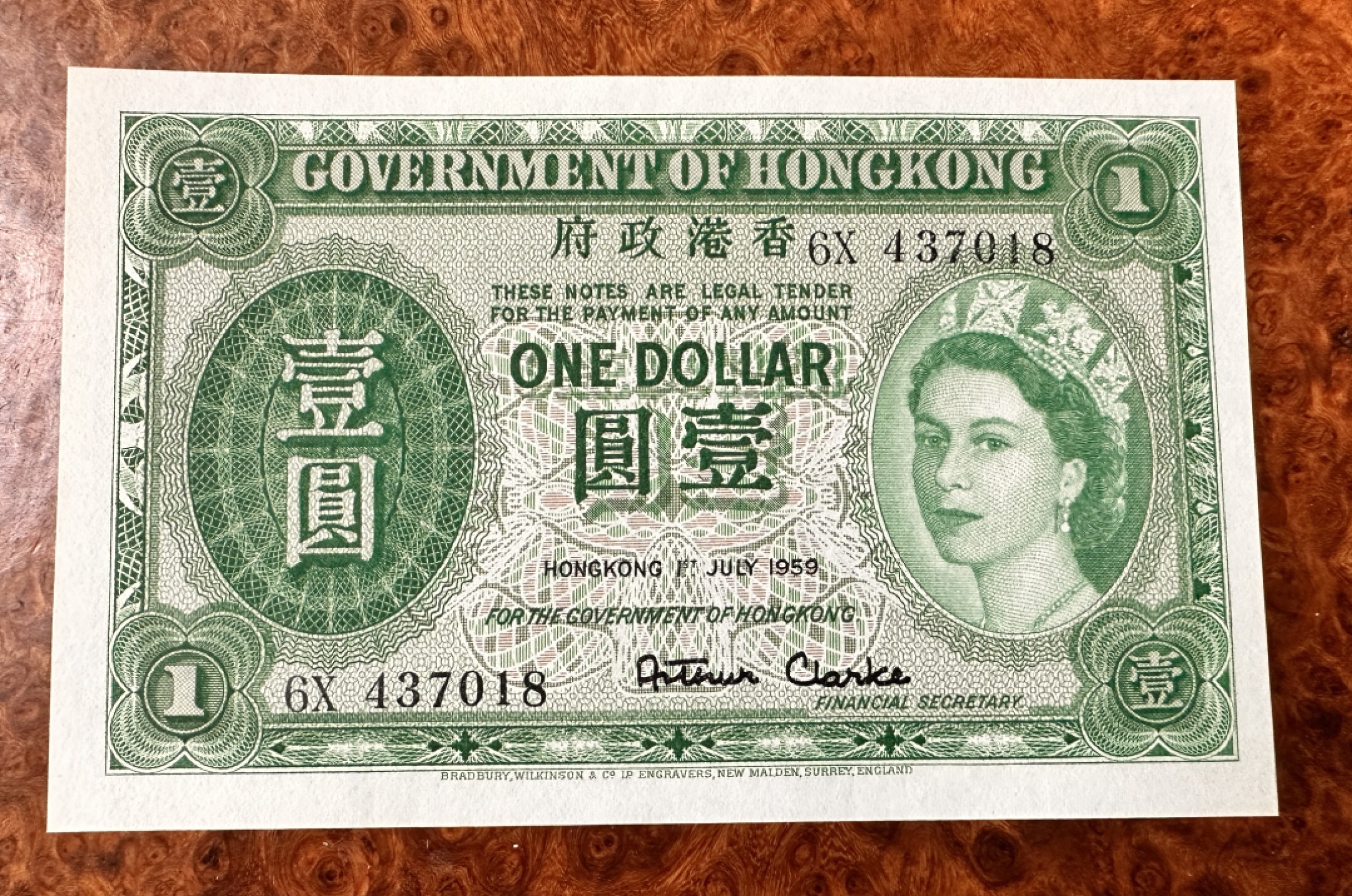 Chase Auction 第18期 - - 外钞、民国钞和人民币混合场！ 早期香港1元，大冠女王，品相如图，UNC-