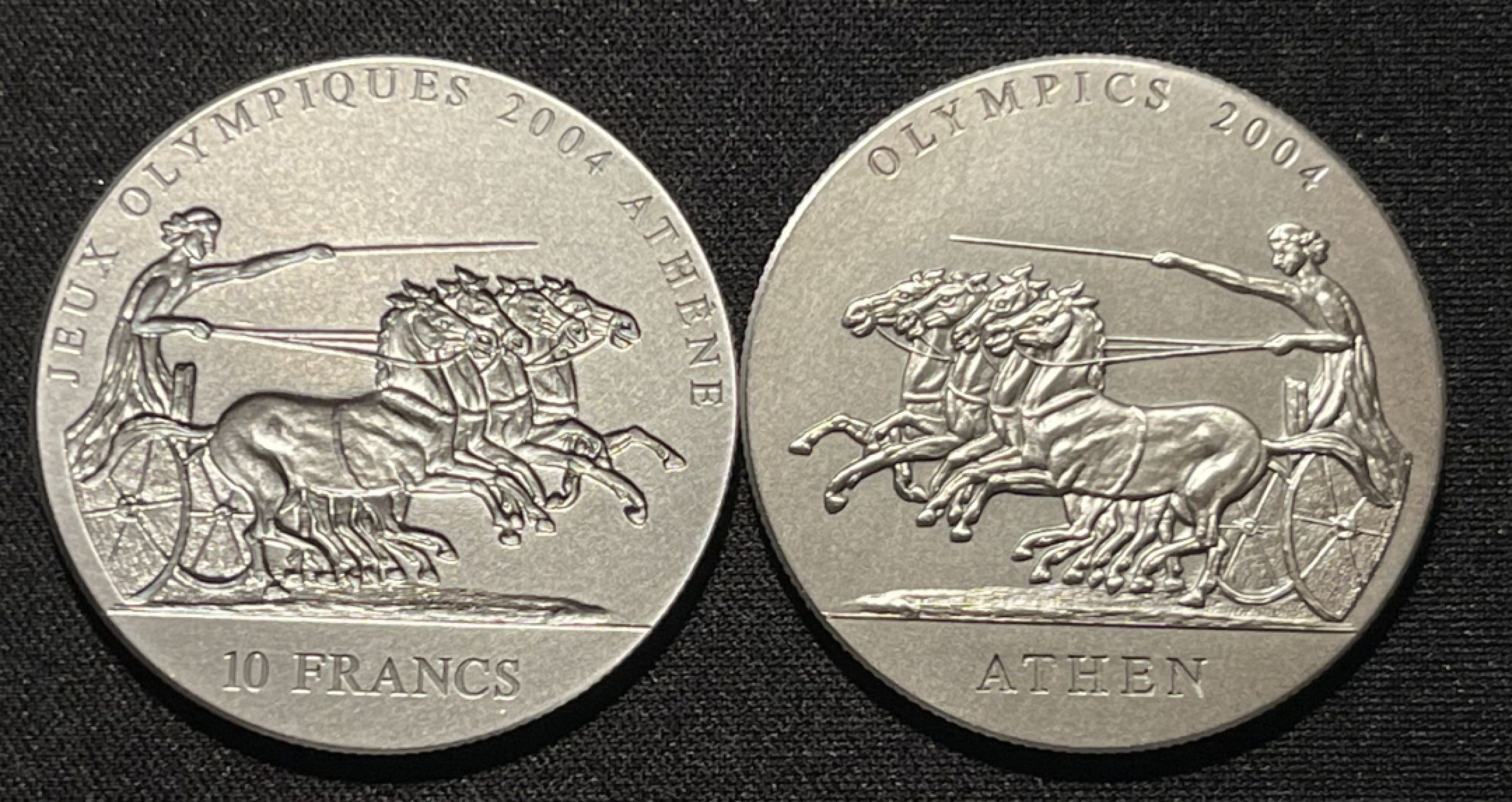 紫瑗钱币——第264期拍卖 刚果 加纳 2001年 联合发行 雅典奥运会 古代战车 10法郎 500塞地 阴阳币 共62.2克 0.999银