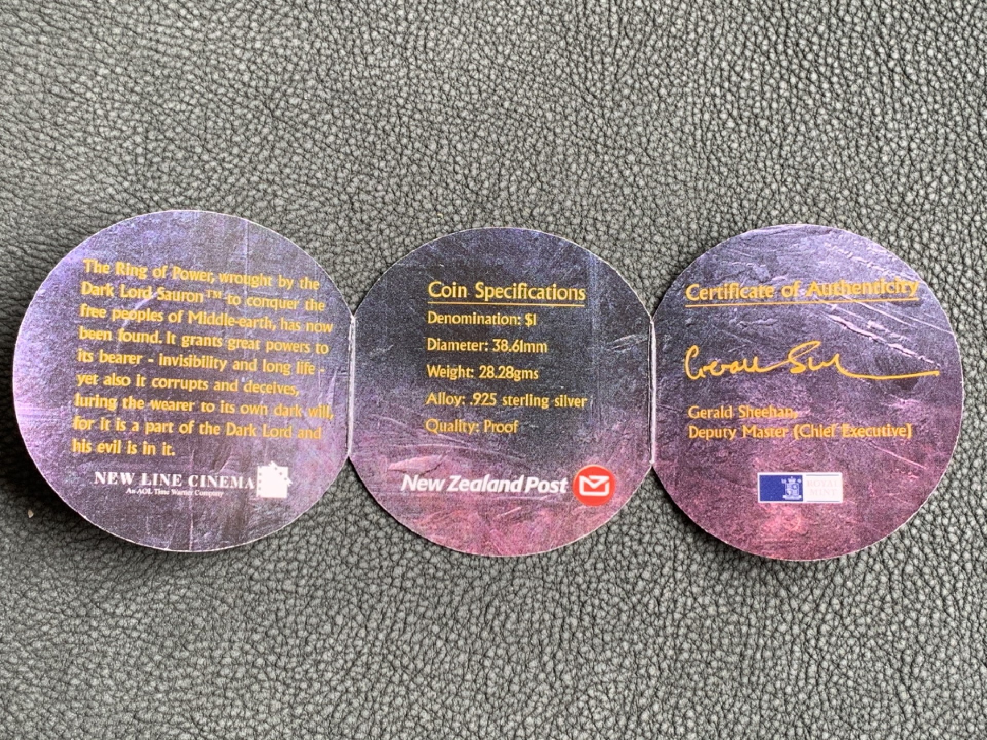 《竞宝斋》第140场-周日，周一，周四 3拍 (全场包邮) 新西兰2003年 指环王镀金戒指 1元 精制大银币 28.28克 925银 原盒证书 非常稀少