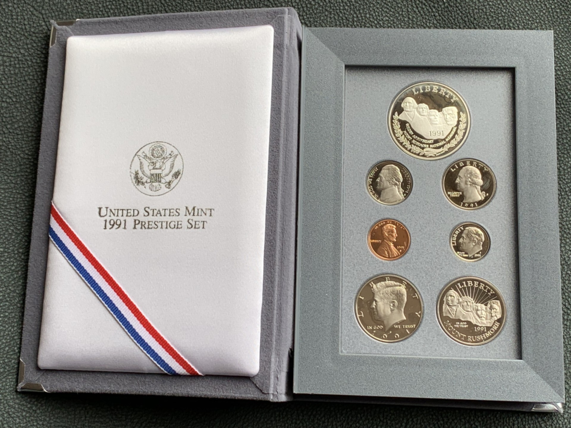 《竞宝斋》第140场-周日，周一，周四 3拍 (全场包邮) 美国1991年 精制七枚套 其中最大的1元是银币 原盒证书