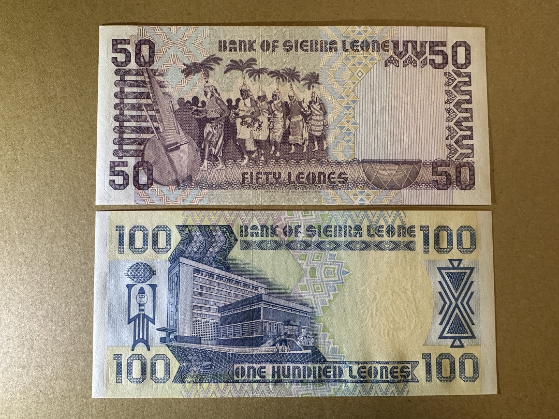 《张总收藏》92期——外币精品大会100拍 塞拉利昂50、100元2张 UNC 1989年版本
