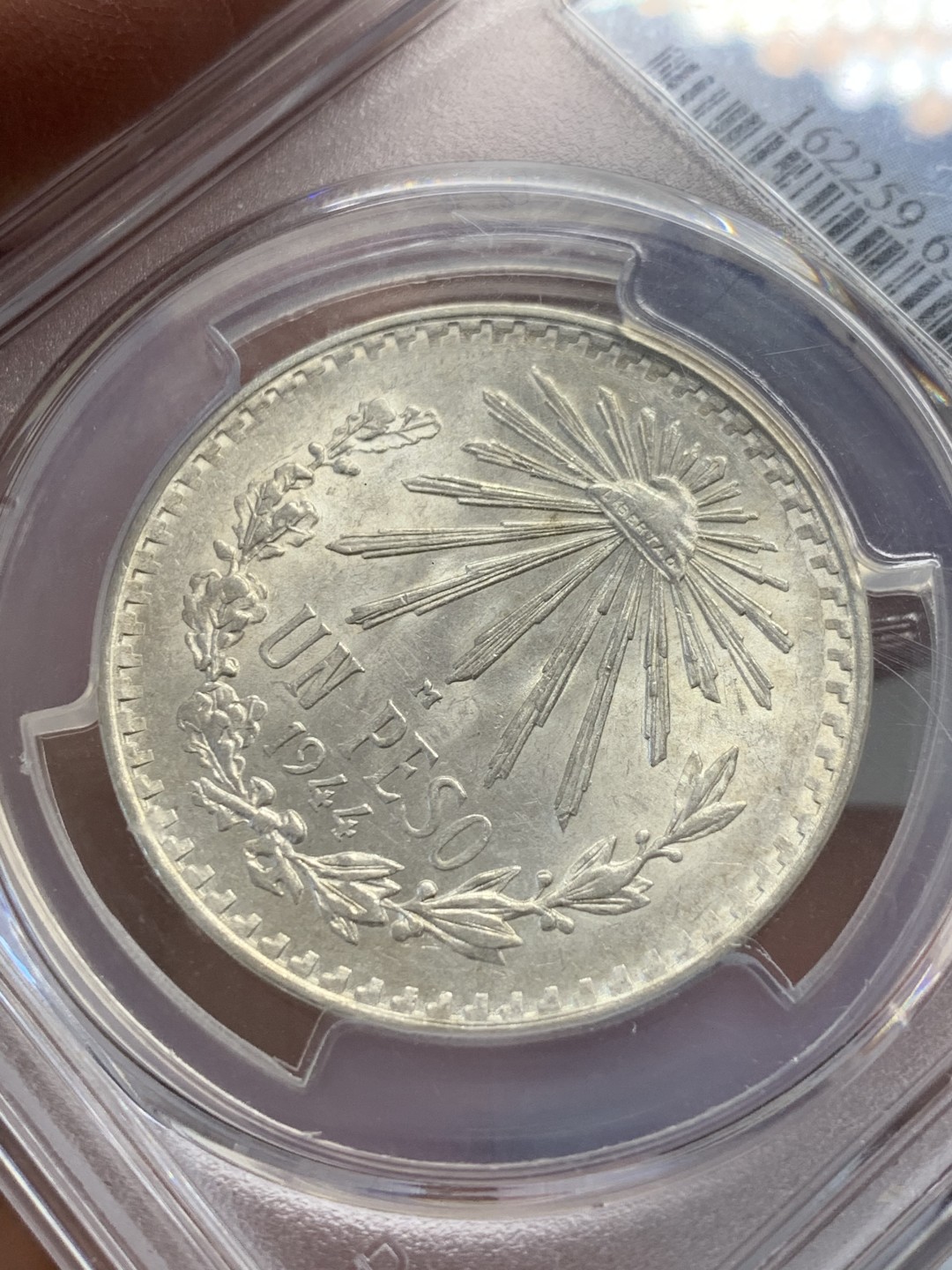 《竞宝斋》第141场-周日，周一 2场 (全场包邮) PCGS MS65 1944墨西哥银币  原光原彩 上涨品种