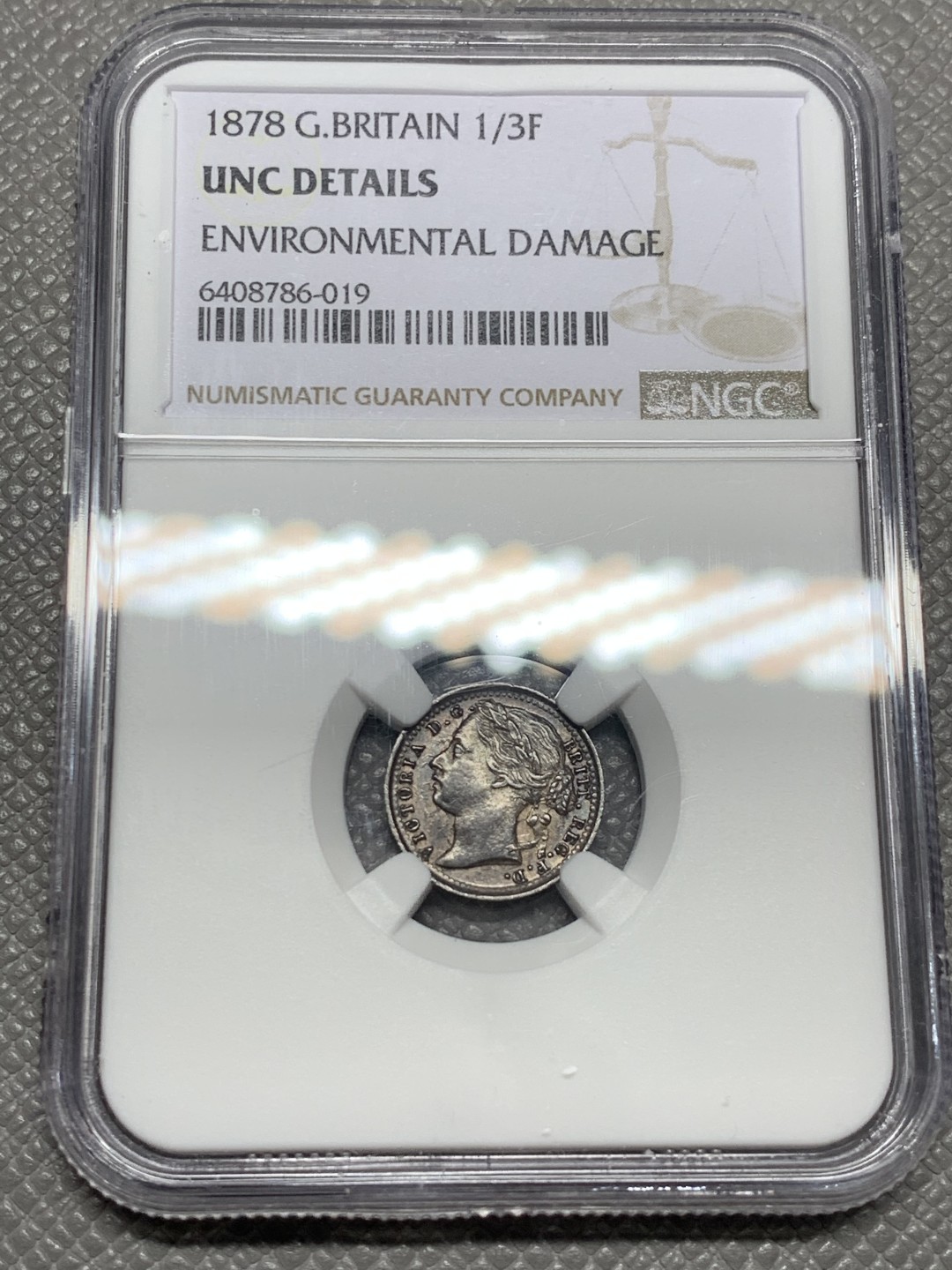 《竞宝斋》第141场-周日，周一 2场 (全场包邮) NGC-UNC 英国1878年 维多利亚女王 1/3F铜币 早期青年头很难见到这样的品相 没有出分有点可惜