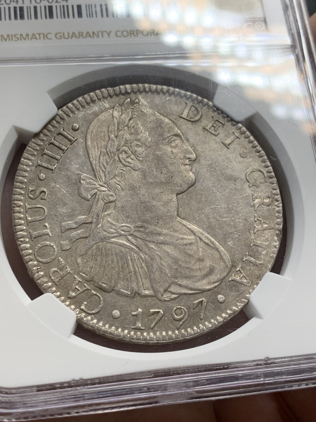《竞宝斋》第141场-周日，周一 2场 (全场包邮) NGC AU 墨西哥 1797年 卡四 双柱大银币 深打不错 可藏