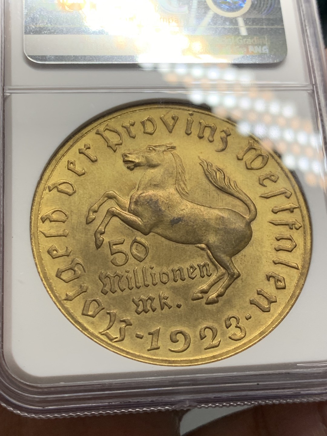 《竞宝斋》第141场-周日，周一 2场 (全场包邮) NGC-MS64 5000万马克！德国威斯特伐利亚1923年5000万马克马币镀金币 厚重压手 金光闪闪