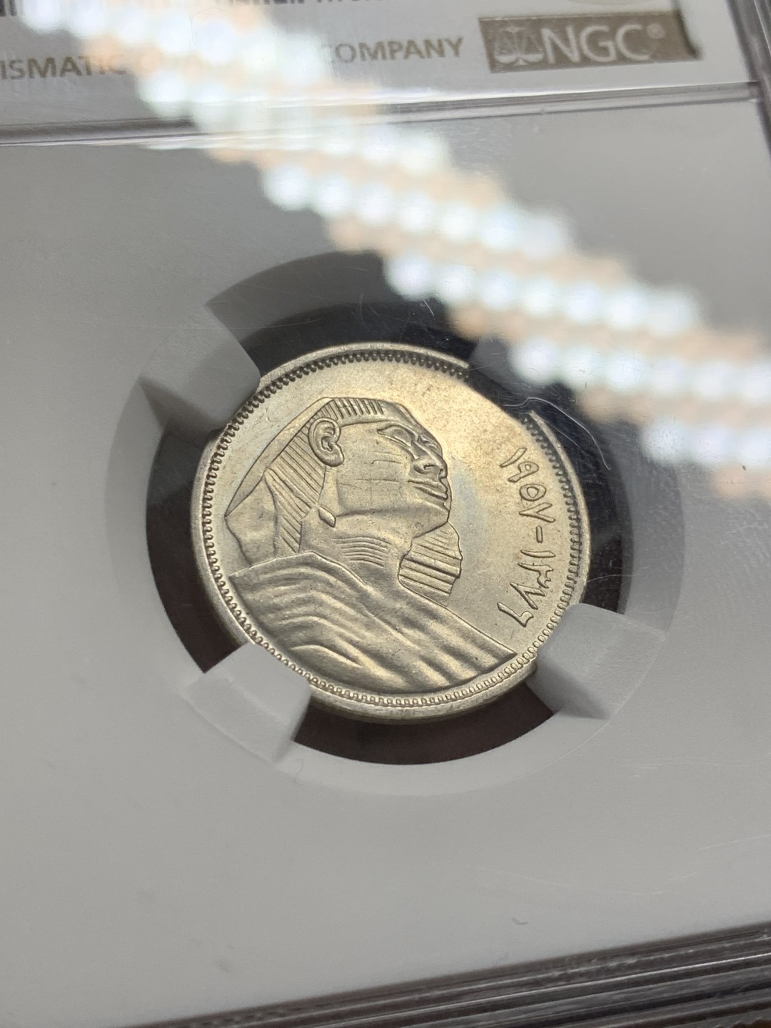 《竞宝斋》第141场-周日，周一 2场 (全场包邮) NGC MS64 埃及1957年狮身人面像5皮阿斯特银币，埃及最有特色的标志物