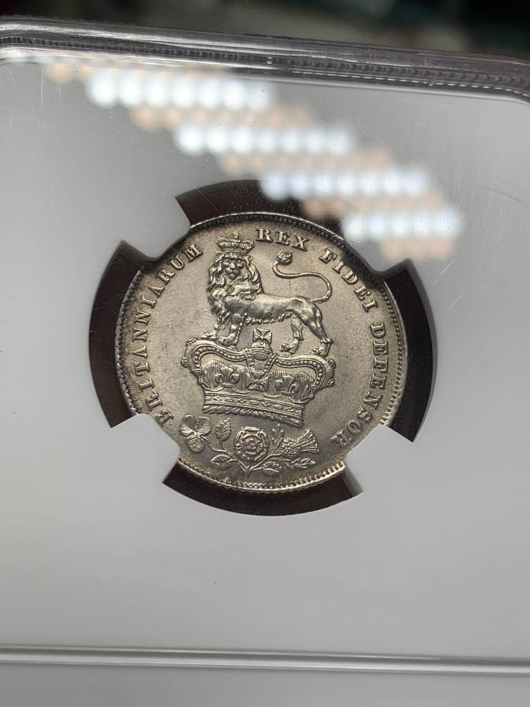 《竞宝斋》第141场-周日，周一 2场 (全场包邮) NGC UNC 英国 1826年 乔治四世先令银币 未见明显缺陷 品相细节很好