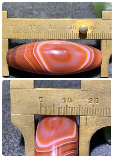 仅此一颗！精美高润度红沁天眼纹药师玛瑙天珠形桶珠一颗， 仅此一颗！精美高润度红沁天眼纹药师玛瑙天珠形桶珠一颗，