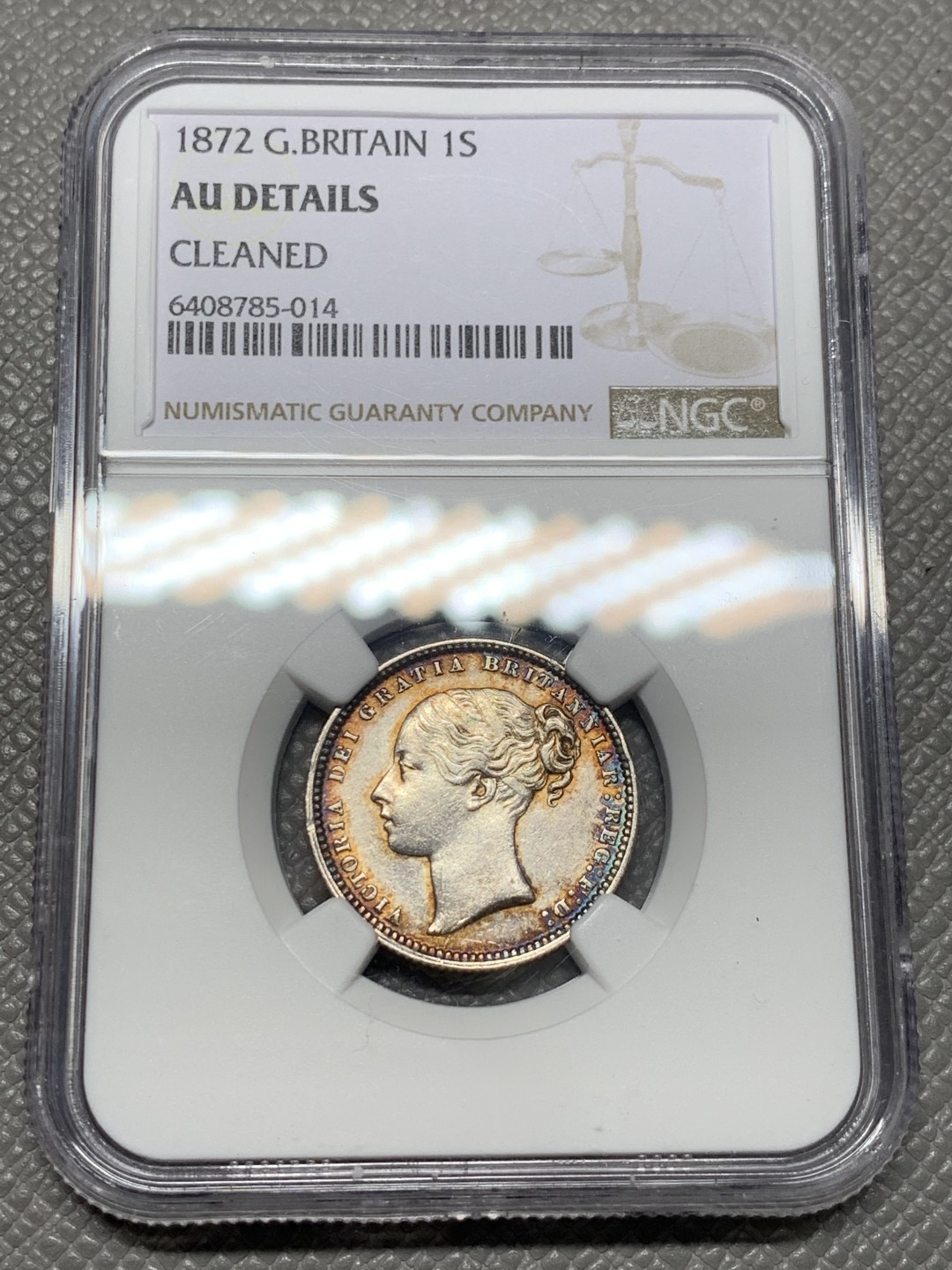 《竞宝斋》第141场-周日，周一 2场 (全场包邮) NGC-AU 英国1872年 维多利亚女王年轻版 1先令银币 带彩包浆 非常漂亮