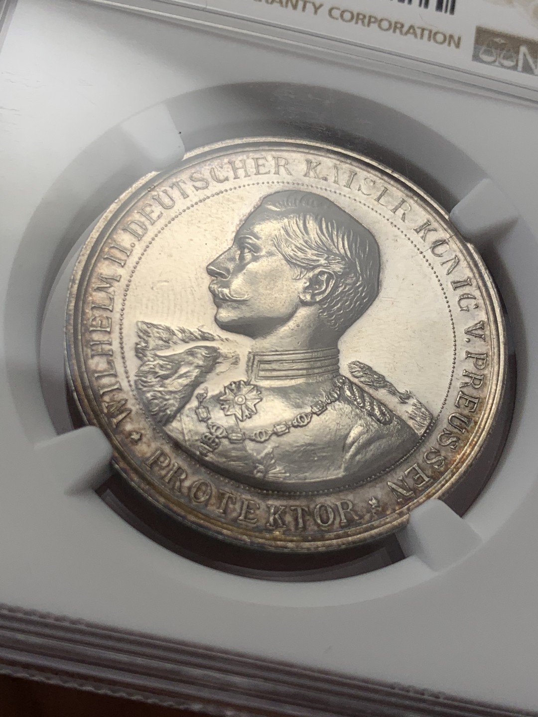 《竞宝斋》第141场-周日，周一 2场 (全场包邮) NGC-MS61 19世纪末 德国威廉二世银章 类镜面pl底板，靓丽环彩包浆，状态出色 细节满满