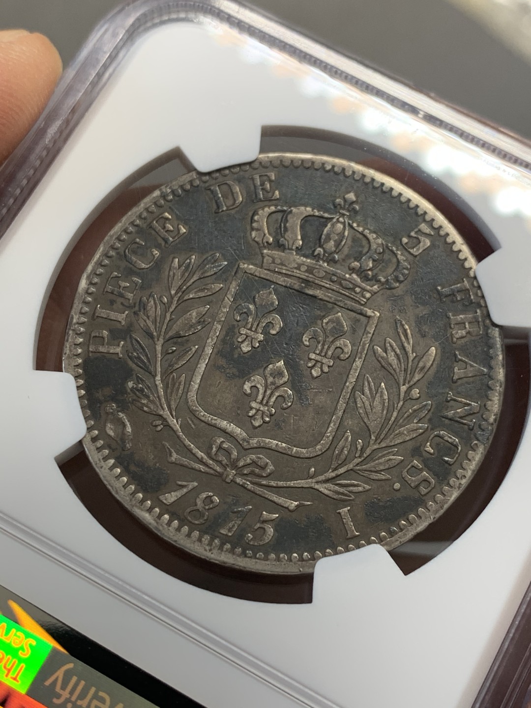 《竞宝斋》第141场-周日，周一 2场 (全场包邮) NGC XF 1815年 法国 路易十八5法郎戎装版 原味好品，军装版状态很好，很稀少品种，特别是背面状态难得，可惜没给分。绝大多数这个品种的币都是清洗，原味的更难得