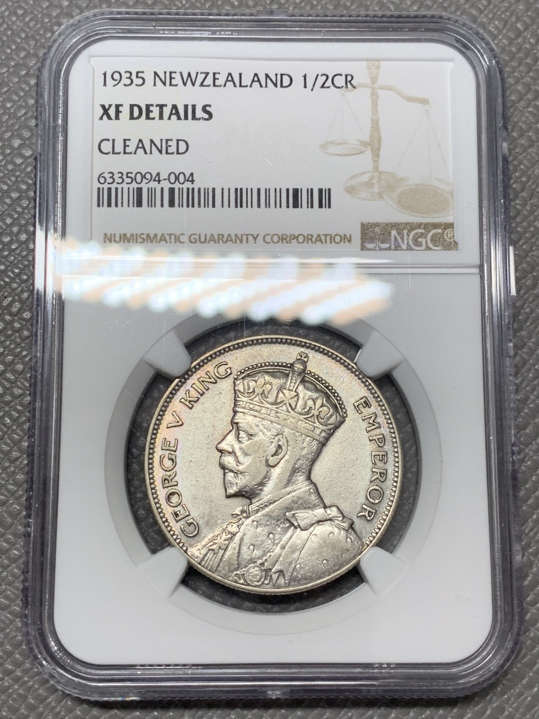 《竞宝斋》第141场-周日，周一 2场 (全场包邮) NGC-XFD 1935新西兰乔五半克朗银币