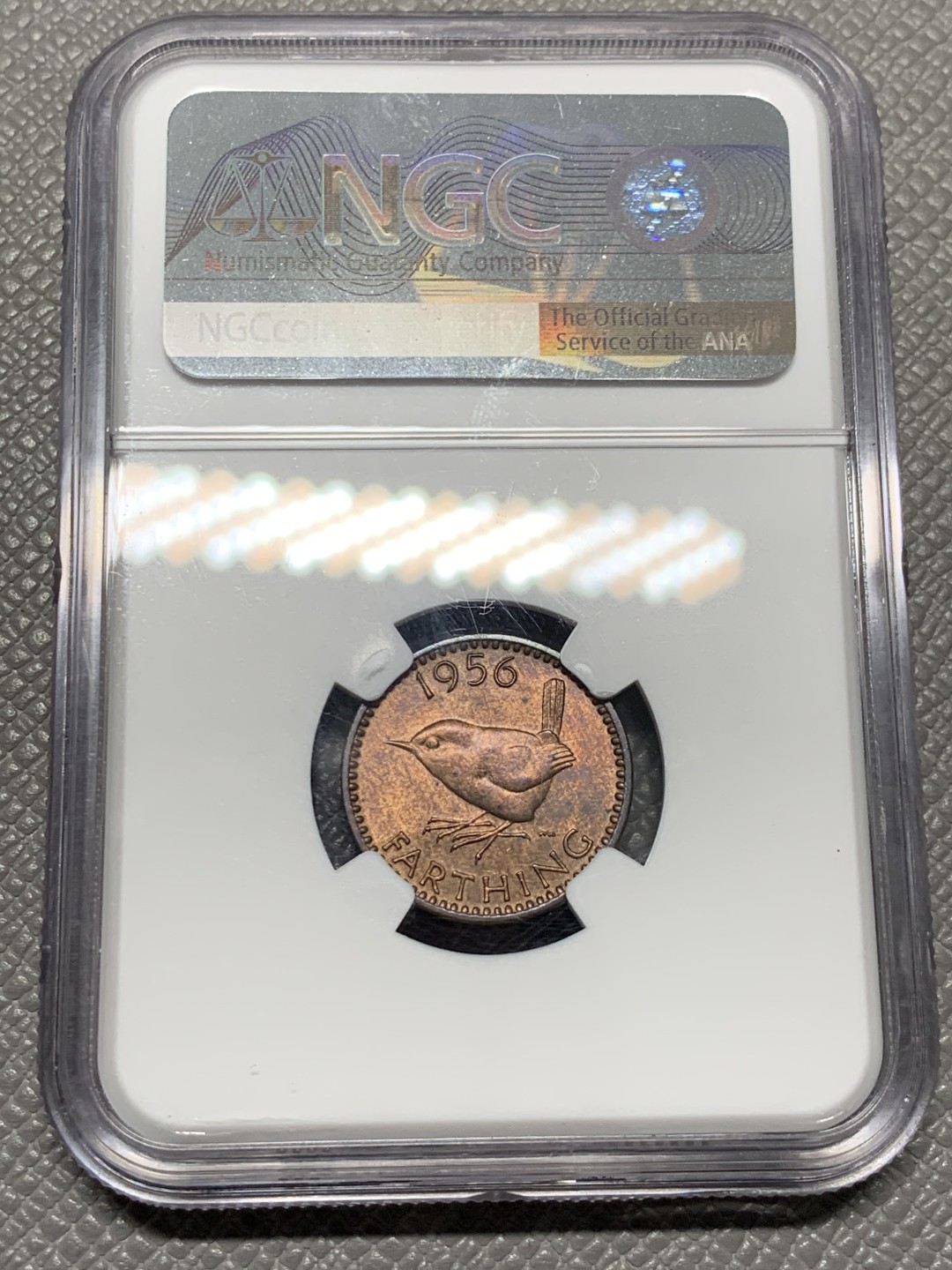 《竞宝斋》第141场-周日，周一 2场 (全场包邮) 第三名 NGC-MS64 英国1956年 1/4便士 铜币 这样高分的英国小辅币价格也涨了很多