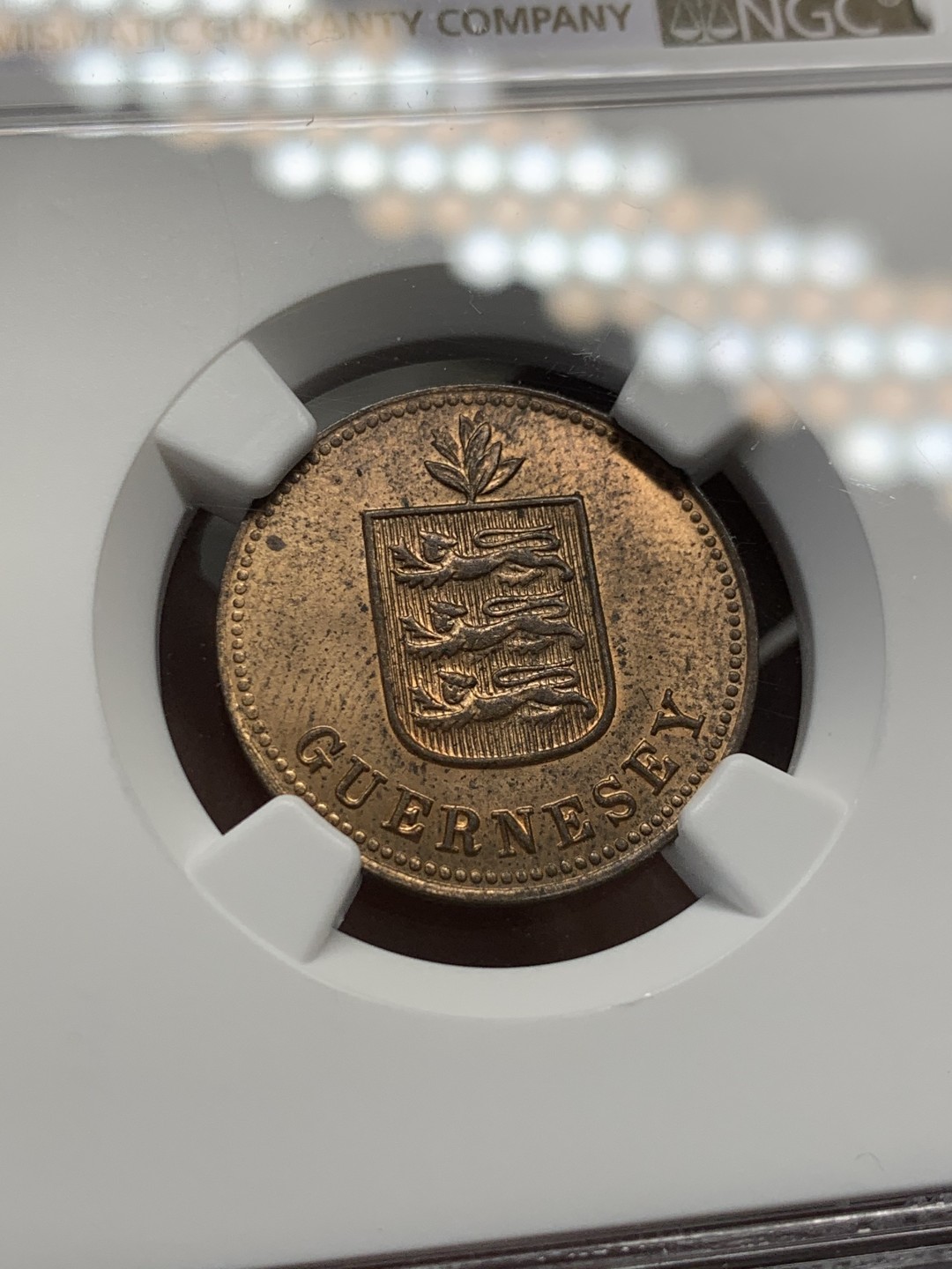 《竞宝斋》第141场-周日，周一 2场 (全场包邮) NGC-MS63RB 英属根西1929 2道布铜币，喜敦厂铸造，经典三狮设计，RB铜光靓丽