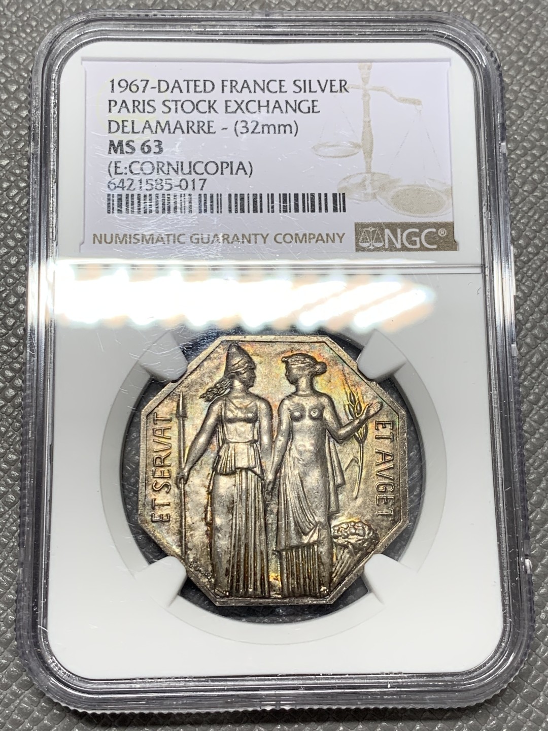 《竞宝斋》第141场-周日，周一 2场 (全场包邮) NGC MS63 1967年法国巴黎证券交易所八角银质代币 绚丽五彩包浆 非常好