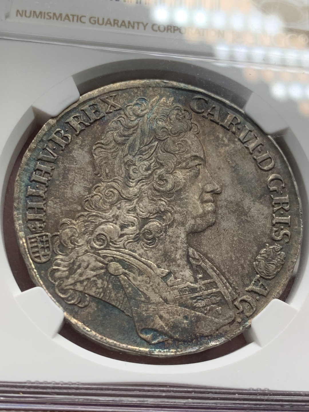 《竞宝斋》第141场-周日，周一 2场 (全场包邮) 冠军分 NGC-MS61 匈牙利 1729年 1泰勒银币 蓝彩包浆