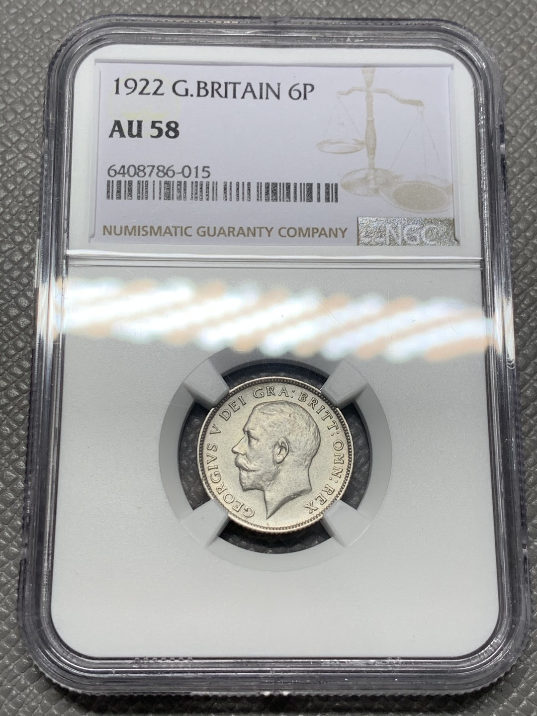 《竞宝斋》第141场-周日，周一 2场 (全场包邮) NGC-AU58 英国1922年 乔五6便士银币 原光好品