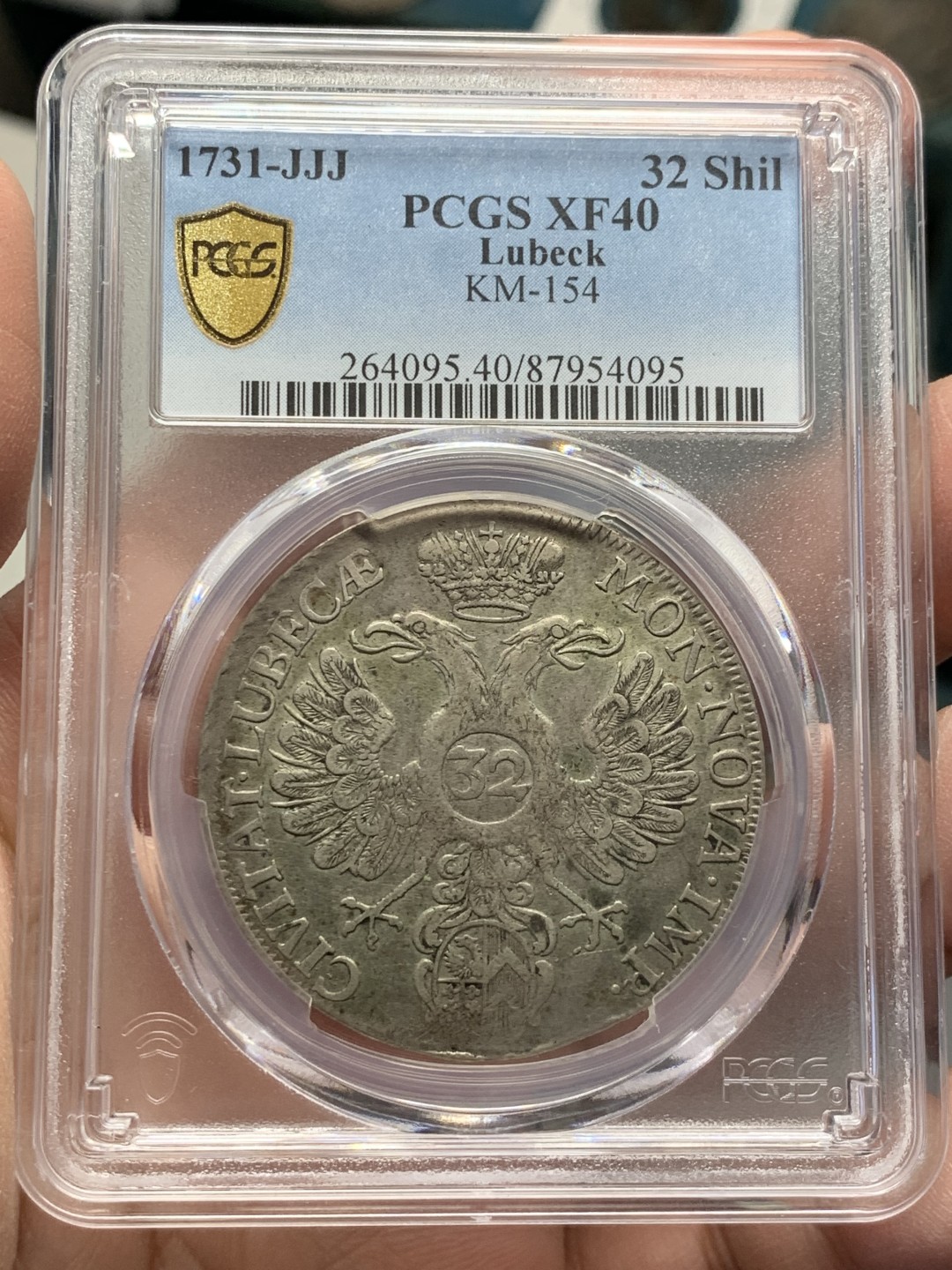 《竞宝斋》第141场-周日，周一 2场 (全场包邮) 亚军分 PCGS-XF40 1731年 德国 吕贝克自由市32先令大银币 汉萨同盟的中心 原味老包浆，鹰羽细节清晰，状态舒服