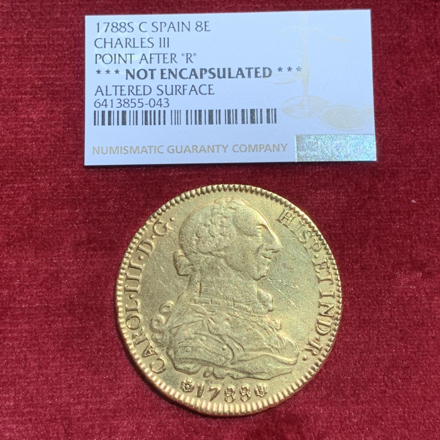 《竞宝斋》第141场-周日，周一 2场 (全场包邮) 西班牙1788年 卡洛斯三世 塞维利亚厂造 8埃斯库多大金币 稀少厂名 高价买过来评级的 NGC说表面修改没有入盒 带评级标签 重：26.35克   细节如图