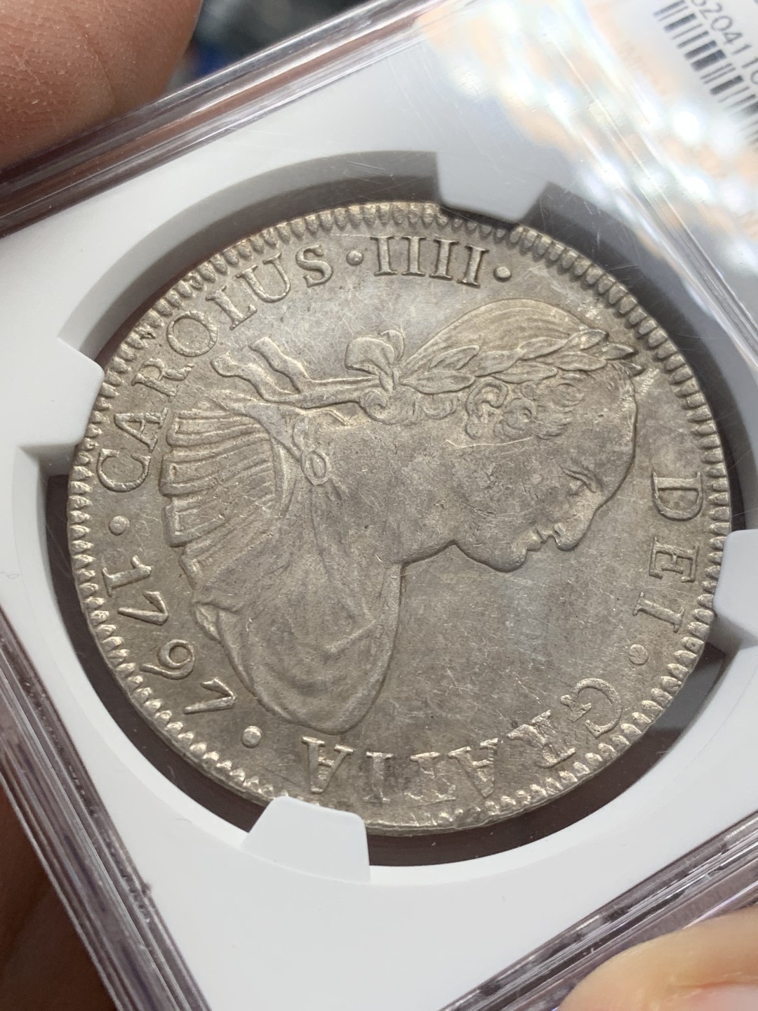 《竞宝斋》第141场-周日，周一 2场 (全场包邮) NGC AU 墨西哥 1797年 卡四 双柱大银币 深打不错 可藏