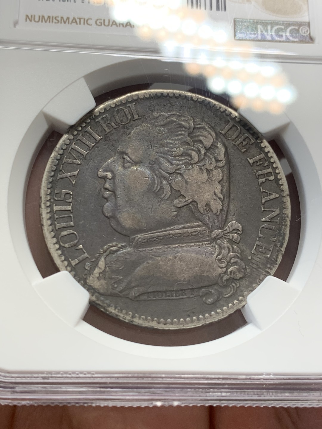 《竞宝斋》第141场-周日，周一 2场 (全场包邮) NGC XF 1815年 法国 路易十八5法郎戎装版 原味好品，军装版状态很好，很稀少品种，特别是背面状态难得，可惜没给分。绝大多数这个品种的币都是清洗，原味的更难得