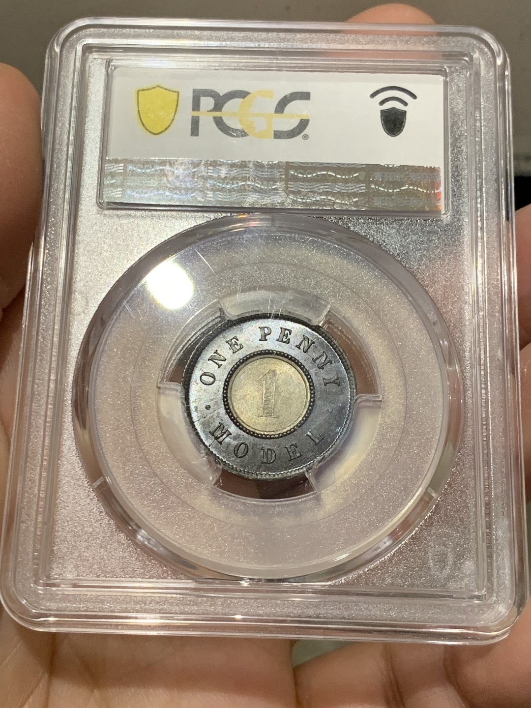 《竞宝斋》第141场-周日，周一 2场 (全场包邮) PCGS MS63 亚军分 英国 1844年 维多利亚女王 1便士双色model 世界上早期的双色币 外环均匀紫罗兰包浆氧化光彩动人 PC广告币 63中很好看的一枚