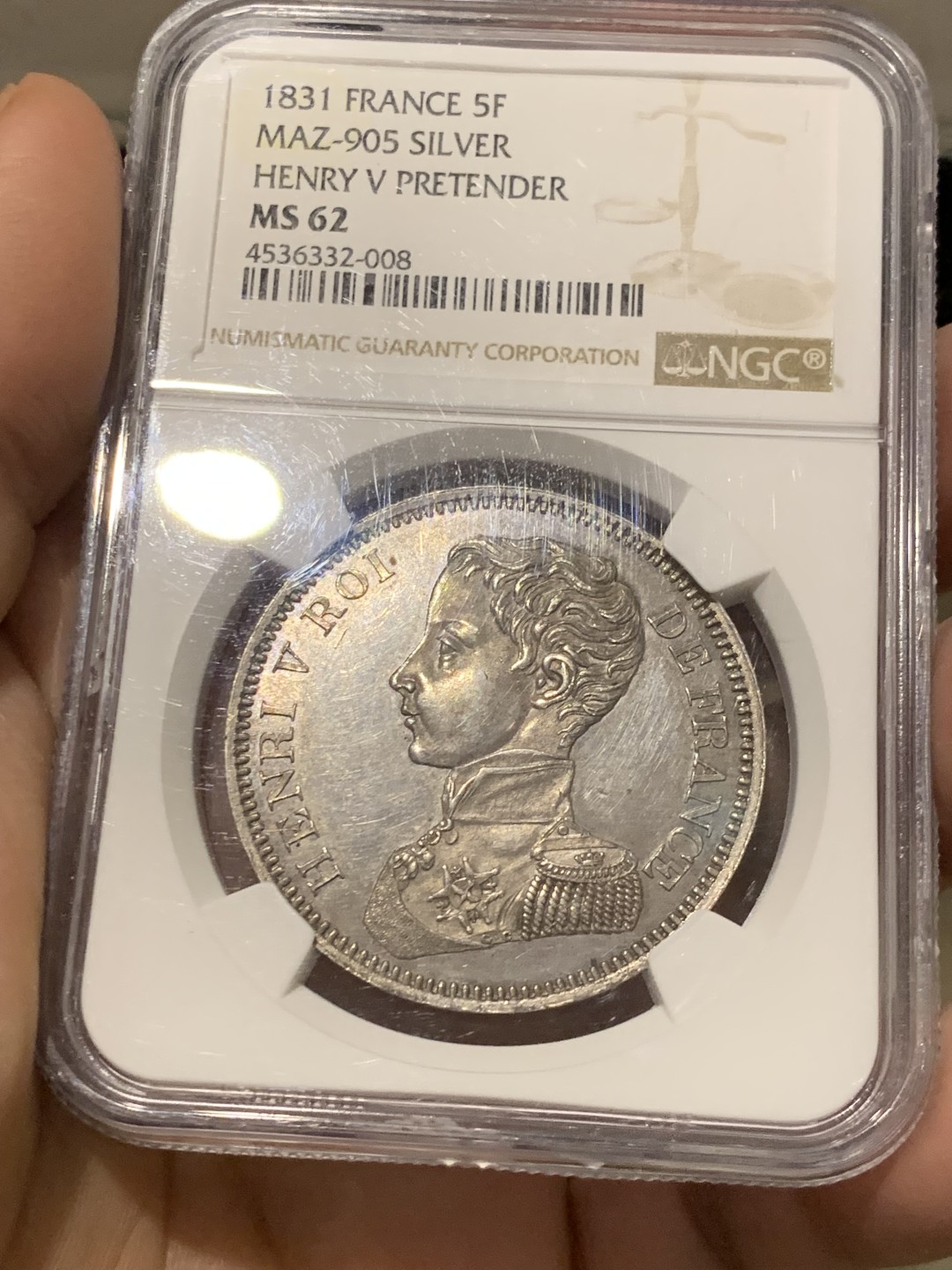 《竞宝斋》第141场-周日，周一 2场 (全场包邮) NGC-MS62 1831年法国亨利五世5法郎样币 亨利五世仅仅做了7天的法国国王就被迫让位给路易菲利普，他是正统派的拥立对象。此币铁灰包浆，状态不错