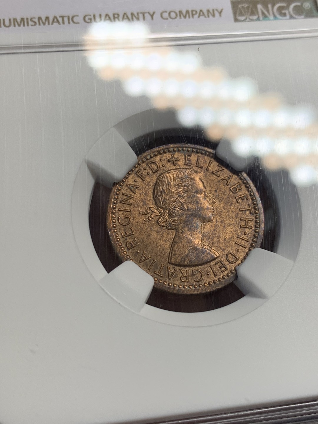 《竞宝斋》第141场-周日，周一 2场 (全场包邮) 第三名 NGC-MS64 英国1956年 1/4便士 铜币 这样高分的英国小辅币价格也涨了很多