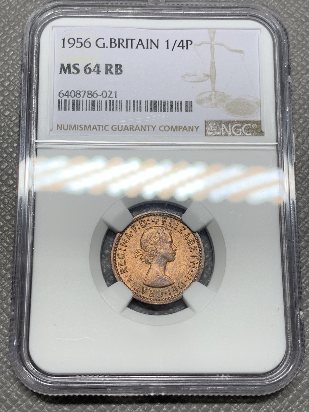 《竞宝斋》第141场-周日，周一 2场 (全场包邮) 第三名 NGC-MS64 英国1956年 1/4便士 铜币 这样高分的英国小辅币价格也涨了很多