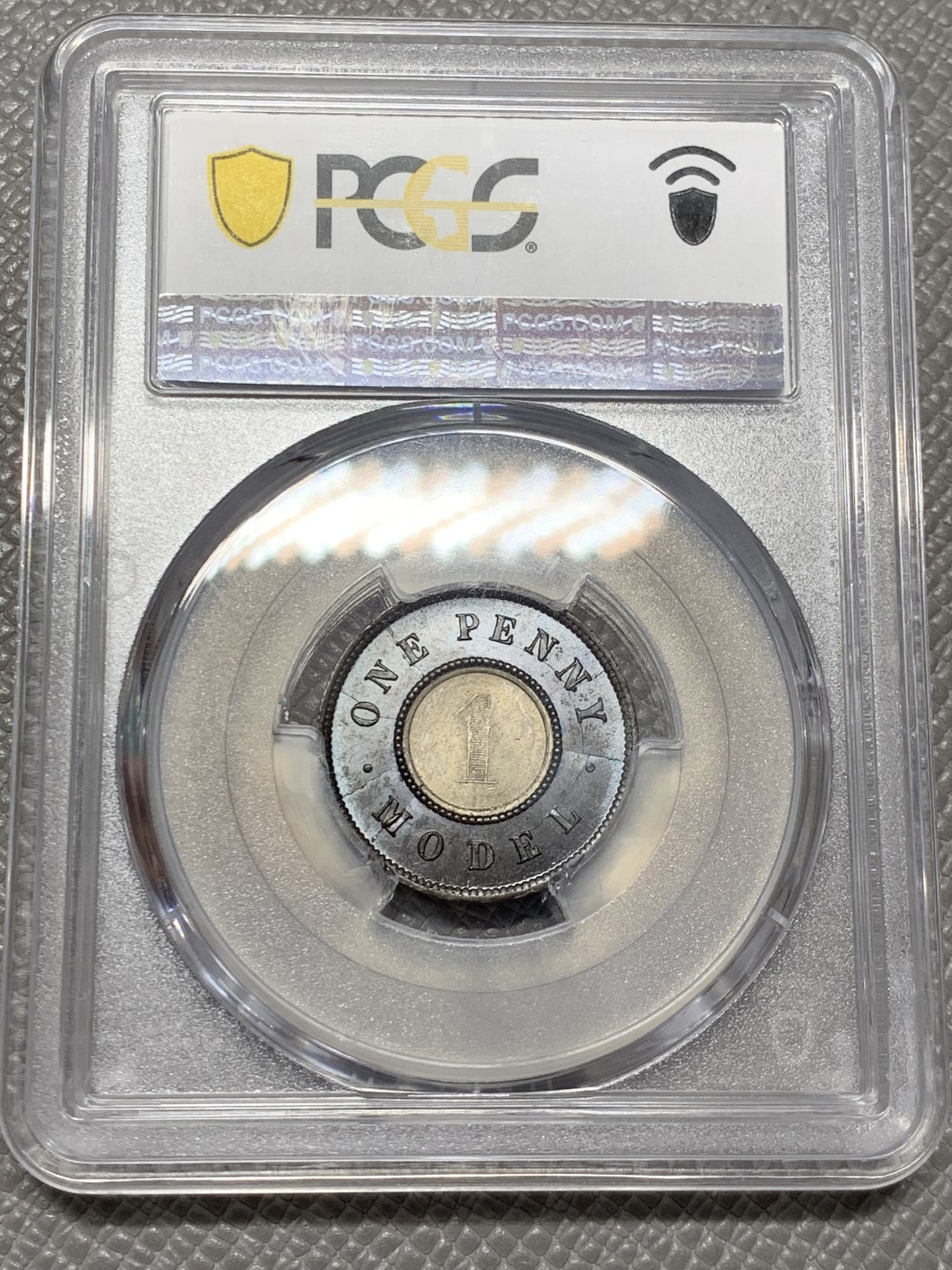 《竞宝斋》第141场-周日，周一 2场 (全场包邮) PCGS MS63 亚军分 英国 1844年 维多利亚女王 1便士双色model 世界上早期的双色币 外环均匀紫罗兰包浆氧化光彩动人 PC广告币 63中很好看的一枚