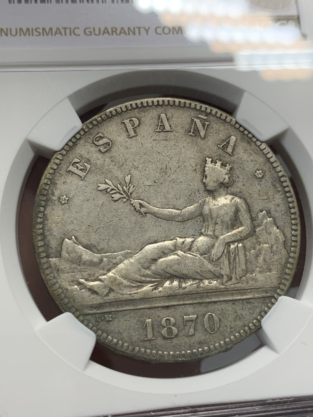 《竞宝斋》第141场-周日，周一 2场 (全场包邮) NGC-XF 西班牙1870年 坐人拿花 5比塞塔 双柱大银币