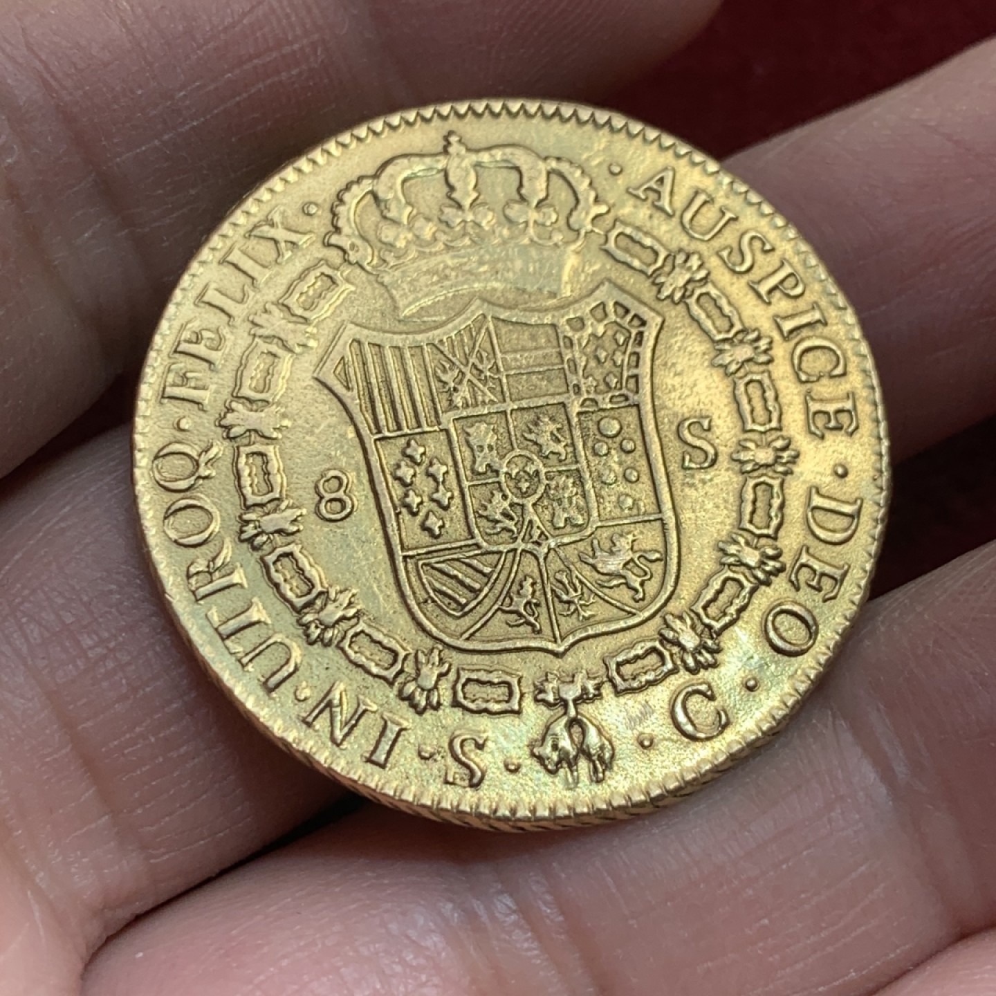《竞宝斋》第141场-周日，周一 2场 (全场包邮) 西班牙1788年 卡洛斯三世 塞维利亚厂造 8埃斯库多大金币 稀少厂名 高价买过来评级的 NGC说表面修改没有入盒 带评级标签 重：26.35克   细节如图
