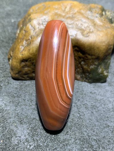 仅此一颗！精美高润度红沁天眼纹药师玛瑙天珠形桶珠一颗， 仅此一颗！精美高润度红沁天眼纹药师玛瑙天珠形桶珠一颗，