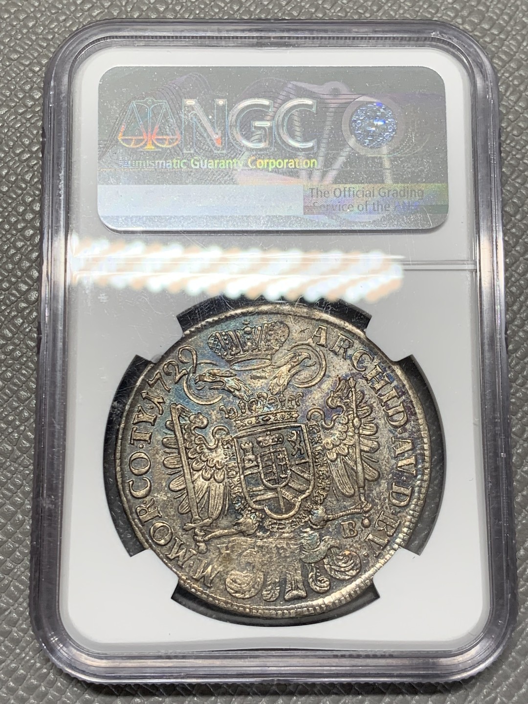 《竞宝斋》第141场-周日，周一 2场 (全场包邮) 冠军分 NGC-MS61 匈牙利 1729年 1泰勒银币 蓝彩包浆