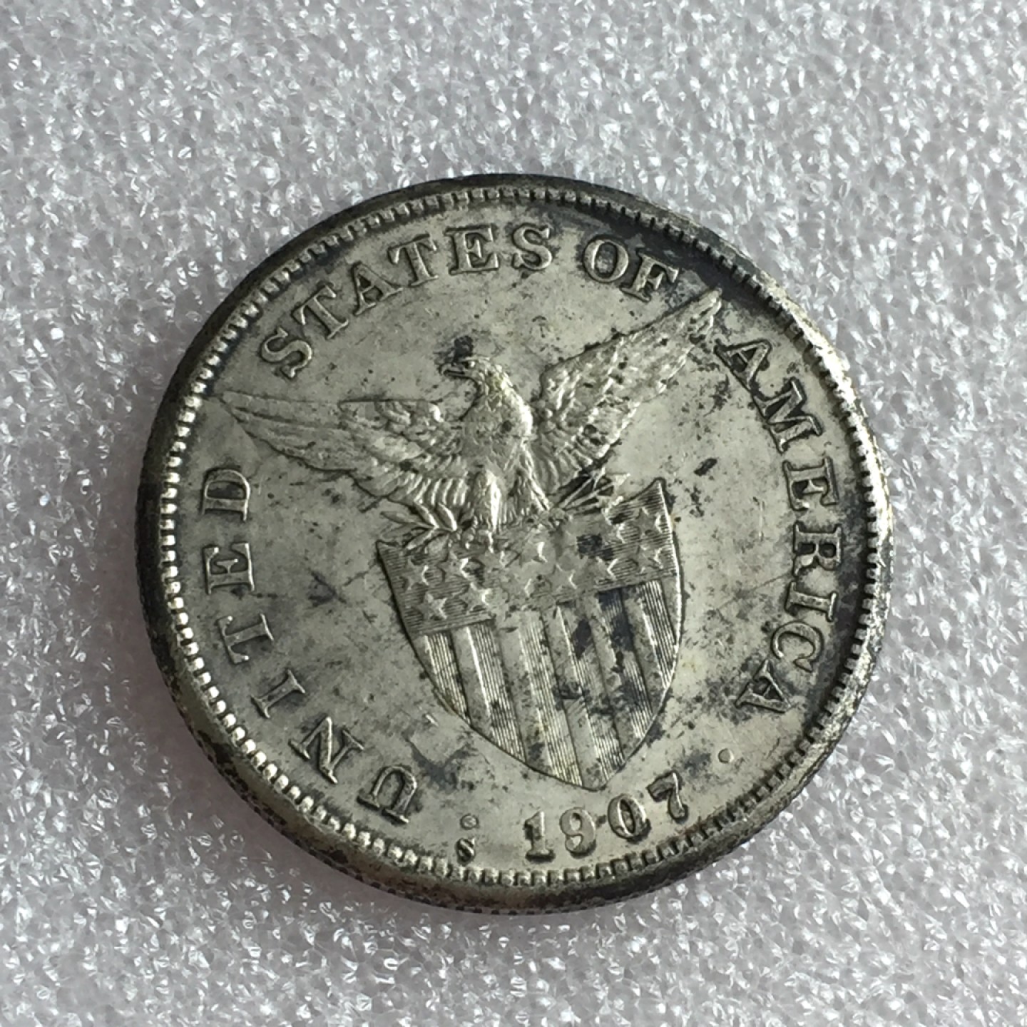 方圆集藏首期专场 9832-美属菲律宾1907年火山打铁女神一比索银币