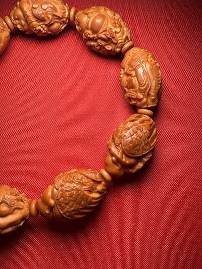 手串木器杂件｜精选拍卖专场 苏工精雕｜“骑兽弥勒”橄榄核手串