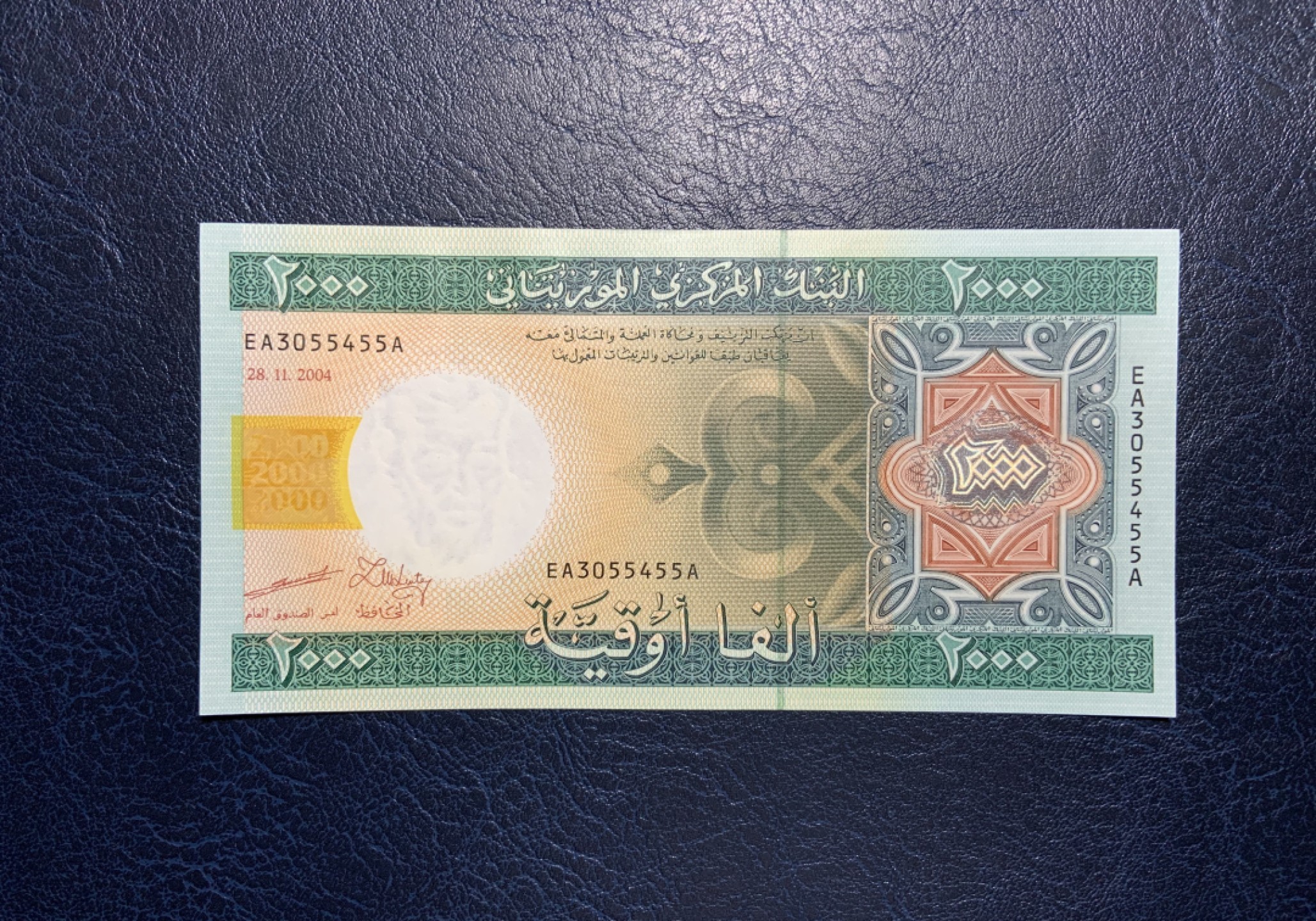 收藏联盟Quantum Auction 第238期拍卖 毛里塔尼亚2004年2000乌吉亚 品相UNC 角微瑕 首发冠 首版签名