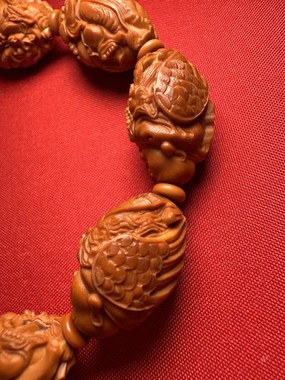 手串木器杂件｜精选拍卖专场 苏工精雕｜“骑兽弥勒”橄榄核手串