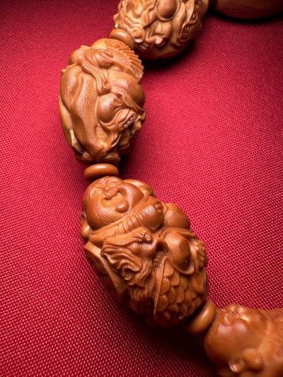 手串木器杂件｜精选拍卖专场 苏工精雕｜“骑兽弥勒”橄榄核手串