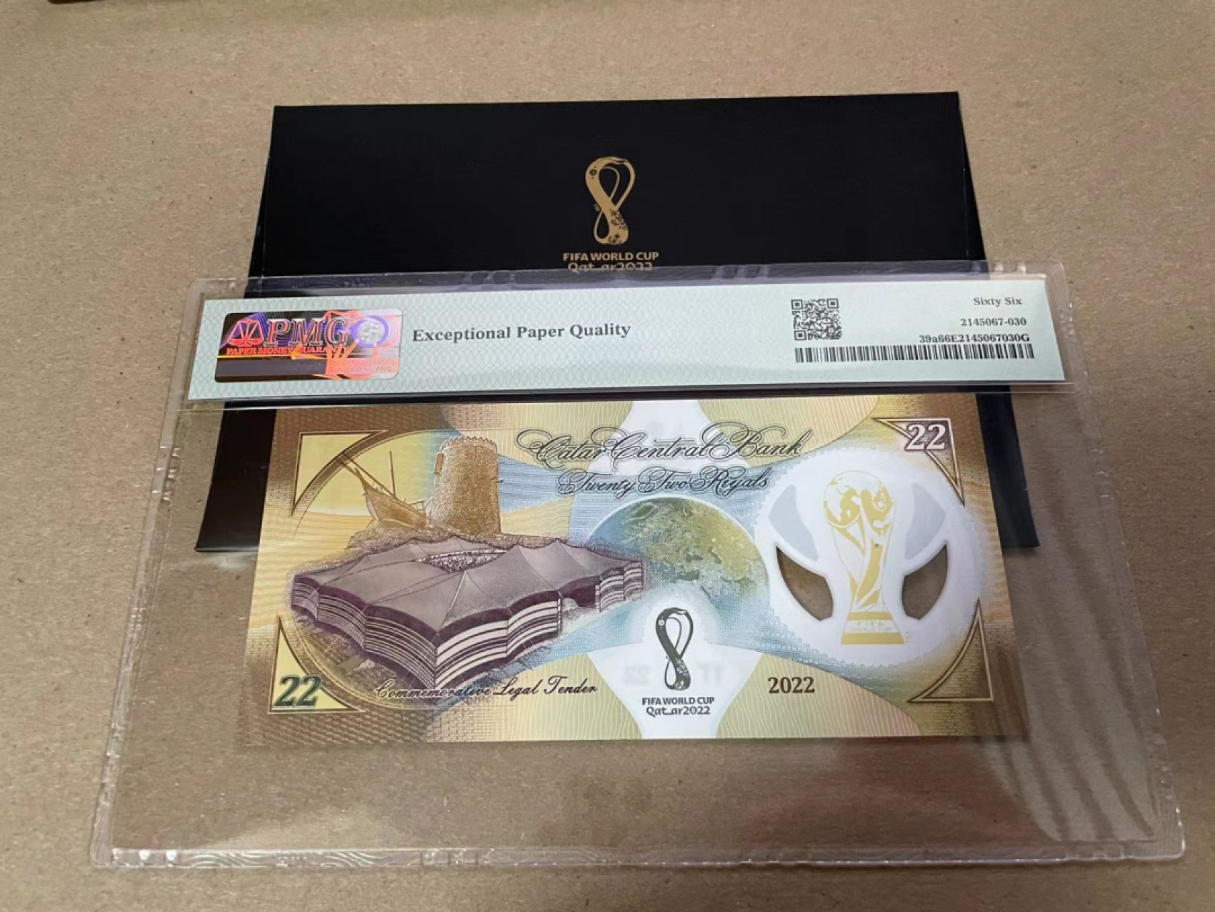 【Blue Auction】✨世界纸币精拍第301期——新纪元  【无47 带册】卡塔尔 2022年22里亚尔 世界杯纪念钞 PMG66EPQ 