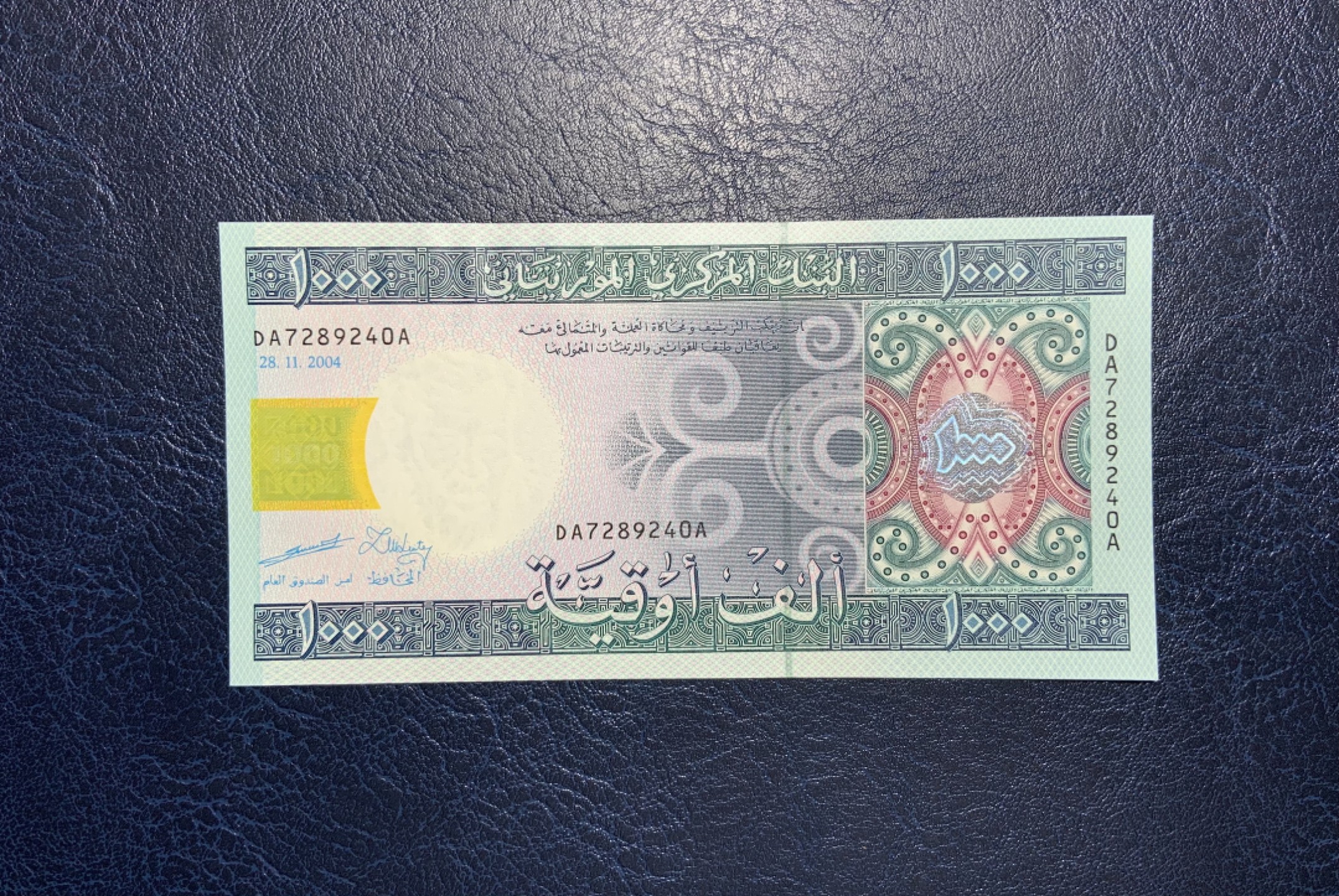 收藏联盟Quantum Auction 第239期拍卖 毛里塔尼亚2004年1000乌吉亚 品相全新UNC 首发冠 D为面值代码