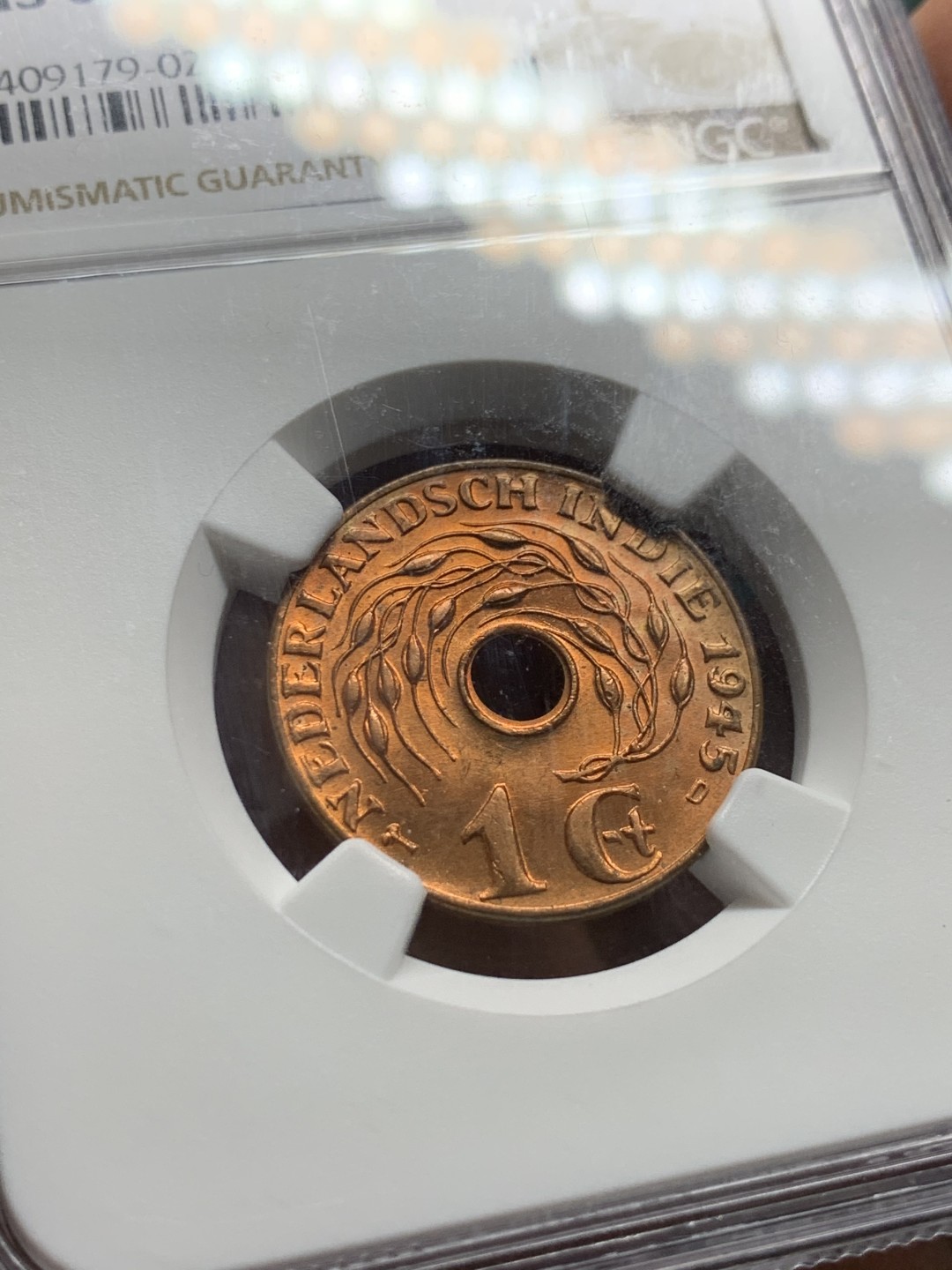 《竞宝斋》第143场-周日，周一 2场 (全场包邮) NGC-64RB 荷属东印度1945年D版1C铜币。原光卷拆品，十分精美