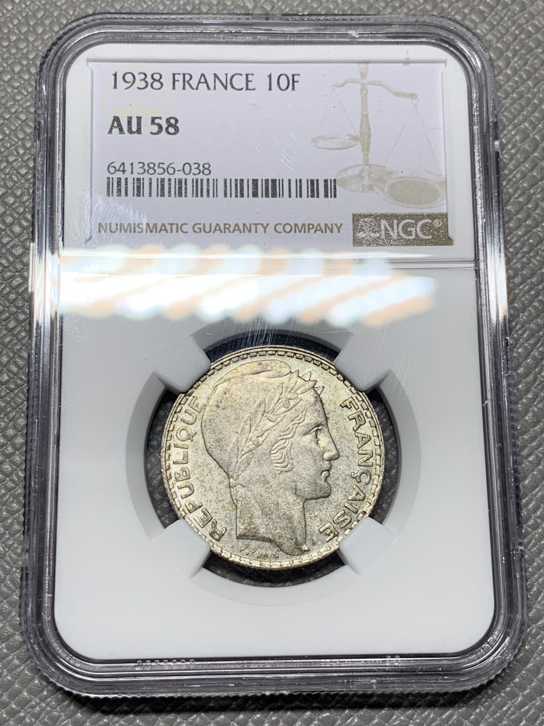 《竞宝斋》第143场-周日，周一 2场 (全场包邮) NGC-AU58 法国1938年 谷物女神10法郎银币 五彩包浆 低评