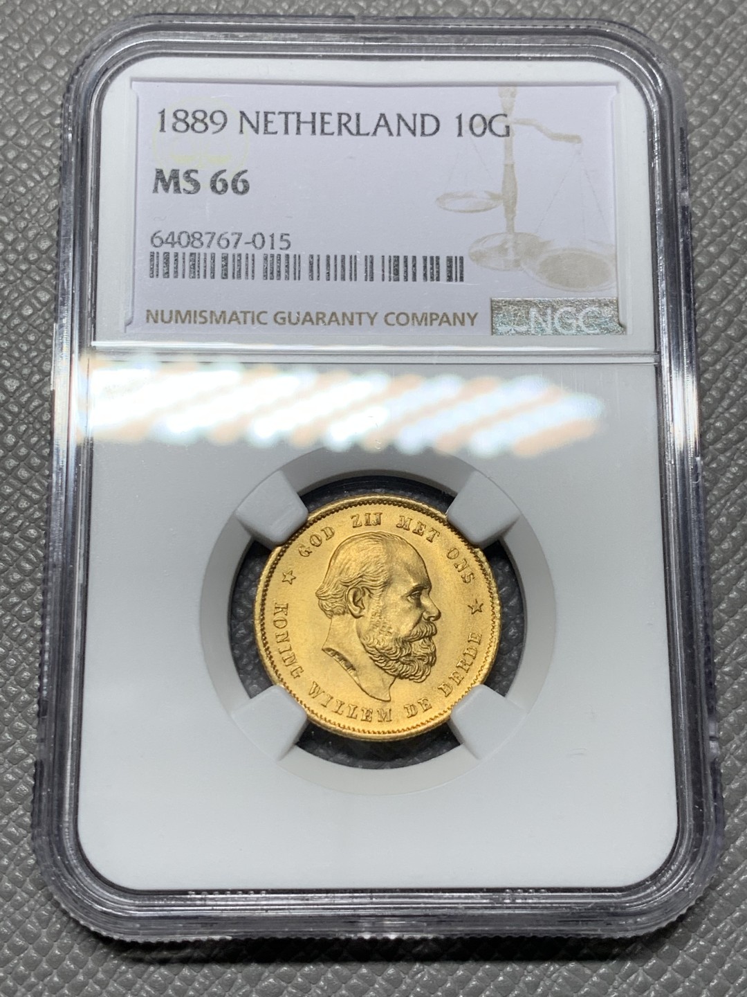 《竞宝斋》第143场-周日，周一 2场 (全场包邮) NGC-MS66 荷兰1889年 威廉三世 10盾金币 顶极品相 一枚就毕业