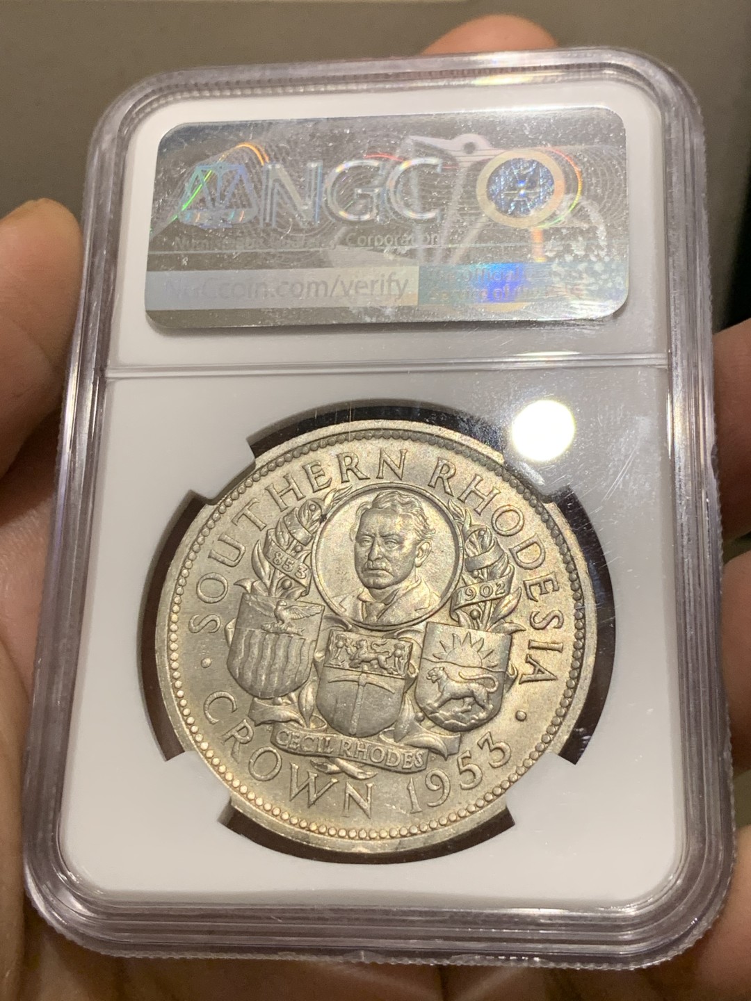《竞宝斋》第143场-周日，周一 2场 (全场包邮) NGC  MS64 南罗德西亚1953年1克朗银币正面伊丽莎白二世女王背面殖民地头子伊安·史密斯发行的第一枚银币